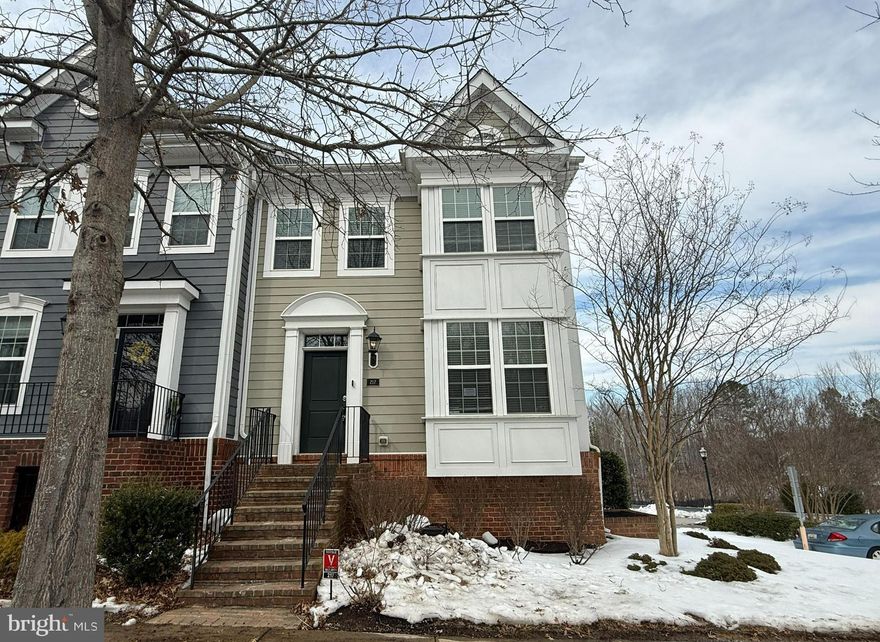 Welcome to this 3-level, 2-car garage end-unit townhome in The Villages of Steeplechase, conveniently located near the heart of La Plata, MD. Step inside to a spacious, open living room featuring hardwood floors and a gas fireplace. The kitchen/dining combo offers a large center island, granite countertops, stainless steel appliances, and generous cabinet space, great flow for everyday living and entertaining. Just off the kitchen, enjoy the rear deck, a perfect spot to unwind and catch sunset views.  Upstairs, you’ll find a sizable primary suite with hardwood flooring, a walk-in closet, and an en-suite full bath, plus two additional bedrooms, a hall bath, and an upper-level laundry closet for easy day-to-day convenience.  The lower level features a family/rec room, half bath, and access to the attached 2-car garage with a convenient garage door opener for easy entering and exiting the home.  Close to schools, shopping, dining, and popular local destinations including Port Tobacco Players Theater, La Plata Farmers Market, Laurel Springs Park, Gilbert Run Park, and the Charles County Fairgrounds. The home needs some TLC, offering a great opportunity to refresh and build equity in a sought-after La Plata community. Schedule your showing today and make this home YOURS!