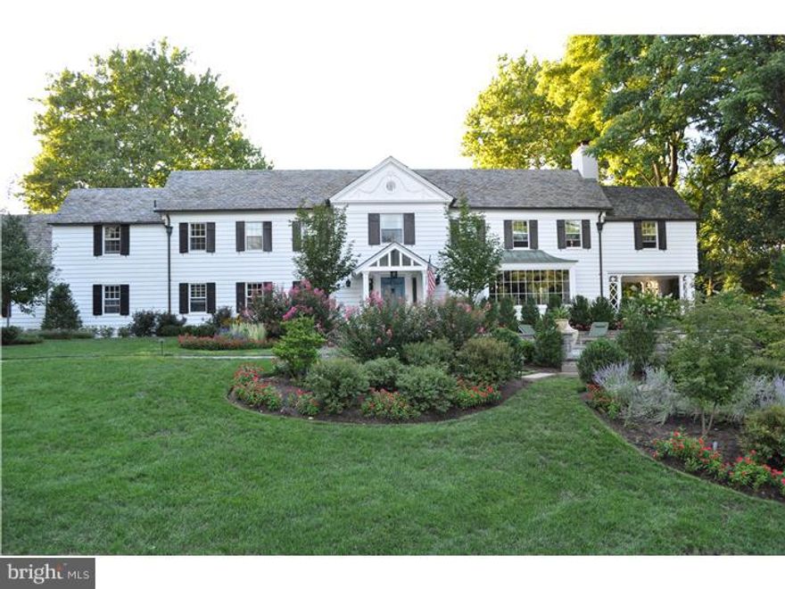 A rare opportunity! Originally built in 1940, this classic 5BR, 4.3 BA colonial has been scrupulously renovated & updated to offer state-of-the-art amenities throughout. Among the brand new spaces are a fabulous kitchen with superior finishes & high end appliances - Calcutta Gold marble counter tops, La Cornue range, custom cabinetry, Miele dishwasher & Belgian Black Stone flooring; a breakfast room with large picture window overlooking flagstone patios & gorgeous landscaping; a new family room with built ins, gas fireplace & Fr. doors to walled patio. The master bedroom has been reconfigured extending the ceiling to the 3rd floor; the master bath is beyond words! There is extensive marble throughout, a steam shower, stand alone tub & even Fr. doors to a Juliet balcony overlooking private grounds. Every room has undergone renovation, new gas & sewer lines, new electrical & cable lines (whole house has been hardwired for multimedia, wireless & internet) new detached 2 car garage. The newly finished basement includes a powder room, rec room with projection TV, exposed stone walls & glass enclosed wine storage area. As you might expect, there are many lovely traditional features including refinished random width hardwood flooring, restored hardware on original solid wood doors and exquisite moldings - both old and new. A custom suspended arch of egg and dart molding is a striking addition which defines the dining room.  This meticulous attention to detail goes beyond the residence itself and extends to the entire property.  Award winning landscape designers (Burke Bros) have created an outdoor paradise encompassing the full two fenced acres.  There are several flagstone patios and pathways, custom plantings and perennial beds, a salt water pool with outdoor shower, and tennis court.  The views from the charming covered sun porch, the second floor terrace and the back yard playhouse are outstanding. Access from the house to the yard can be found in several areas of the living room, the den and family room.  The yard has an irrigation system, including the urns and there is timed lighting, even on the gate post entry.  It is hard to believe that this grand, private country estate is so close to Chestnut Hill, expressways and trains for an easy commute to downtown Philadelphia & only a minute or so to convenience shopping in Flourtown.  This is truly spectacular and must be seen.  Extensive lists of improvements and amenities are available.