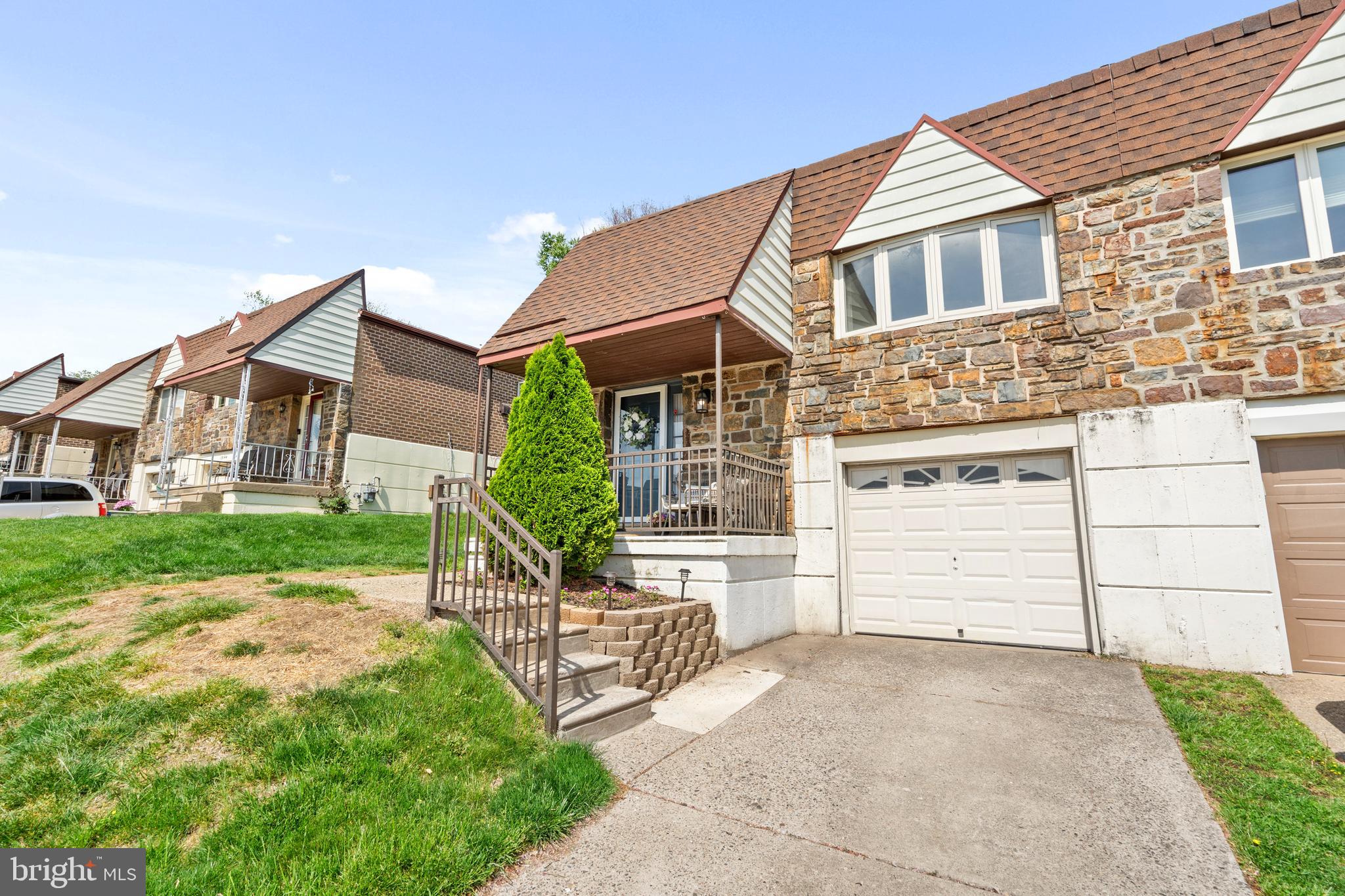 Impeccably renovated and thoughtfully upgraded, this split-level gem sits proudly in the prestigious Somerton neighborhood, widely known as one of Northeast Philadelphia’s most desirable and established communities, characterized by beautiful homes, friendly neighbors, and a perfect balance of convenience and quiet charm. Situated at 15146 Ina Drive, this 4-bedroom, 2.5-bath twin raised ranch has been stylishly updated from top to bottom since the current owners took ownership in 2019.
The main level immediately draws you in with stunning Brazilian hardwood floors, tasteful paint choices and an abundance of natural sunlight. A spacious living room effortlessly flows into a modern kitchen showcasing crisp white cabinetry, granite countertops, stainless steel appliances, and a tasteful glass subway tile backsplash. Each detail was selected to blend everyday functionality with elegance. Adjacent to the kitchen, the dining area provides an inviting setting ideal for everyday meals or gatherings.
On this main level, discover three spacious bedrooms each accented with neutral paint/decor and filled with natural light. The primary bedroom is particularly special, featuring excellent closet space and a newly renovated en-suite bathroom (2024), complete with contemporary tile work, stylish fixtures, and modern finishes. A fresh and clean full hall bathroom serves the additional bedrooms, showcasing crisp and attractive design.
Downstairs, the impressive walk-out lower level truly sets this home apart. It offers a massive family room with a gas fireplace, perfect for relaxing or hosting friends. This floor is also highlighted by a custom-built bar area complete with reclaimed wood accents, a bar tap system, and an epoxy bar top. This lower level also includes a spacious fourth bedroom that is perfect for guests or a private home office. Completing this level is a tastefully updated half bathroom, a convenient laundry room, and two large storage areas.
Step directly outside onto a newly constructed deck (2023) from the lower level family room, creating the perfect setting for grilling, entertaining, or simply unwinding. This outdoor area is private, welcoming, and well-suited for summer evenings and casual weekend gatherings.
Major recent upgrades include a new roof (2024), many replacement windows throughout, and meticulous attention to detail in every update, ensuring that this home is genuinely move-in ready. Somerton offers an unbeatable combination of suburban comfort with easy access to excellent schools, local parks, shopping, transportation, and major roadways.
Homes of this quality in such a desirable location rarely become available—schedule your private tour today and experience firsthand all that 15146 Ina Drive has to offer.