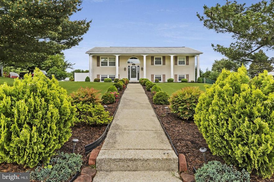 Welcome to this DIY and Investor dream home. This AS-IS property offers an excellent floor plan, updated baths, large secondary bedrooms, and an entirely contemporary feel.  Check out the floor plan in the photos. This hidden gem will easily sell for 600-625K with some elbow grease, cosmetics, and smart choices.
Hard-to-find features include a huge 14X23 primary bedroom with a private balcony overlooking the rear yard, an ensuite spa-inspired bathtub, rainfall shower, and his and hers customized walk-in closet. Large modern kitchen with tons of cabinet pullouts, counters, and a big island. and desk -school work area.  All of this opens onto a 20x20 screened deck.  Downstairs has two very large bedrooms (or office and exercise room) generous family room with a pellet stove and a full bath and laundry.  The home will be emptied before closing. Standard sale with attractive VA ASSUMABLE LOAN.  You do NOT have to be a veteran or in active service.   It is not available to investors.  The current loan balance is approximately $378,000 and is a 30-year fixed at 2.375%.  This works out to a principal and interest of $1582.80 a month!
Drone photography and a floor plan with dimensions are uploaded in photos.  No HOA, huge, level, fenced lot.  Long driveway and parking for 8+ cars.   No showings without a licensed real estate agent.