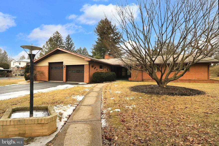 Welcome to this spacious 1962 brick ranch home, located on a serene .43-acre lot in the highly desired College Heights neighborhood of State College. This home is bursting with potential and waiting for your creative touch. Imagine transforming this charming property into a modern masterpiece! With three spacious bedrooms, two main floor full bathrooms, and a cozy living room featuring large windows and a fireplace, the possibilities are endless. The second living room with vaulted ceilings is perfect for entertaining guests, while the functional kitchen offers a classic layout ready for your innovative upgrades. Picture yourself enjoying the lush surroundings from the three-season room or hosting summer barbecues in the partially fenced backyard with a gazebo and shed. The finished basement, with a full bath, provides versatile space for a home gym, office, or entertainment area. The basement can also simply be turned into a guest suite with private entrance. The large two-car garage complete with workspace is ideal for all your DIY projects. Situated just minutes from local shops, restaurants, parks, and Penn State’s signature landmarks. Don't miss out on this incredible opportunity to create your forever home or a profitable investment. Schedule your private tour today and start envisioning your future in this wonderful space!