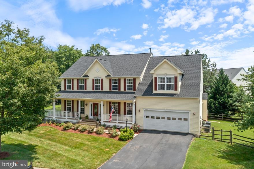 Welcome to this charming 5,100 sq ft custom colonial with wrap-around front porch on a large .31-acre lot located at the end of a quiet cul-de-sac backing to trees in Hailee's Grove of Manassas VA! This residence has been meticulously maintained by the original (and only) owners! Inside, you're greeted to gleaming hardwood floors throughout the main level. This home has both a formal and open concept floorplan! Large formal living and dining rooms with elegant finishes including three-piece crown molding, chair rails, and shadow box trim. The sunken family room has a cozy fireplace, custom built-ins and opens to the gourmet eat-in kitchen with granite countertops, center island with gas cooking, 42-inch maple cabinets, stainless steel appliances, and a huge walk-in pantry. The adjacent sunroom lets in warm natural light and provides access to the rear deck.  A dedicated home office and half bath round out the main level. Upstairs, you will find a very generous primary bedroom with vaulted ceiling, walk-in closet, custom built-ins with shelving and window-side bench seating, along with an attached updated primary bath with two vanities, walk-in shower, and soaking tub. Four additional bedrooms, two more full baths, and the laundry closet complete the upper level. An expansive finished basement awaits you! There, you will find a large recreation room, a bonus room that could be used as a home gym, craft/hobby room, or a spare not-to-code 6th bedroom and another full bath. The basement also has a massive unfinished storage room as well as a walk-out to the fully fenced backyard. UNIQUE FEATURES & UPDATES: New carpet with upgraded padding throughout upper level 2025. New stainless-steel double wall oven 2025. New interior paint throughout 2025. New roof 2024.  New sump pump 2024. New water heater 2021. Dual Zone ACs replaced 2017 & 2020. Trex deck 2016.  Pest control and HVAC have been well cared for under a maintenance contract.  Second refrigerator in the garage conveys. Underground invisible fence for pets! Excellent location with easy access to Rt 234, Rt 28 and the Virginia Railway Express. Zoned for Bennett Elementary, Parkside Middle, and Osbourn Park High School.