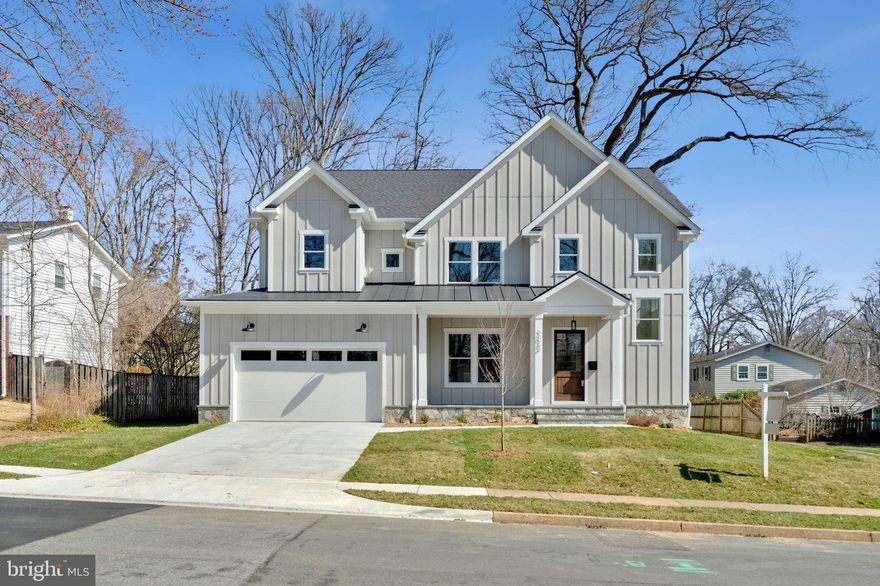 Move in Ready - This stunning new construction by Dunhill Builders offers an exceptional opportunity to own a thoughtfully designed home in the sought-after Dunn Loring Woods neighborhood.  In a prime location on a spacious .29-acre lot, this residence boasts over 6,000 square feet of meticulously crafted interior living space across three levels, featuring 5 bedrooms and 5.5 bathrooms.  The exterior is a standout, showcasing a beautifully landscaped yard, a welcoming front porch with elegant trimmed columns and a wood ceiling, a stone water table, and durable Hardie siding. Step inside to find 10-foot ceilings on the main level, wide plank white oak hardwood floors, extensive trim work, and premium Marvin windows, all exuding quality and sophistication.  The main level is designed for both comfort and entertaining. A formal living room and dining room connect seamlessly via a butler’s pantry, complete with cabinetry and an integrated beverage/wine refrigerator. The expansive family room, centered around a sleek gas fireplace, is bathed in natural light from oversized windows overlooking the backyard. Adjacent is the gourmet kitchen, a chef’s dream with custom cabinetry, quartz countertops, a generous island with ample seating, and a sunlit breakfast area with direct access to the rear yard. A private study, which can easily be converted into a first-floor bedroom, completes the main level.  Upstairs, the second level features three generously sized bedrooms, each with walk-in closets and en-suite bathrooms. The luxurious primary suite is a true retreat, offering an oversized bedroom, a sunlit sitting area, tray ceiling, and dual walk-in closets with custom shelving. The spa-like primary bathroom includes double vanities, a soaking tub, and a tiled shower with double shower heads.  The lower level is equally impressive, offering a spacious recreational room with rough-in for a wet bar, an exercise room, ample storage, and a private bedroom with an en-suite bathroom—perfect for guests, a home office, or extended family.  Don’t miss the chance to make this exceptional property your forever home. Call today for more details!