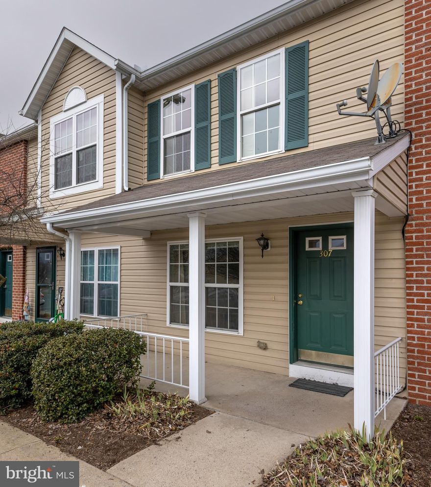 Tidy Stony Pointe condo ready to move in!  This townhome offers open floor plan living space with a large eat in kitchen and spacious living room.  The main floor has updated luxury plank vinyl for easy maintenance, and a convenient half bath.  Each large upstairs bedroom has its own full bathroom, and easy access to the stacked washer and dryer located on the upper level.  A large, dry unfinished basement can handle all of your storage needs.  There are two designated parking spaces that come with this home.  Come and see it today!