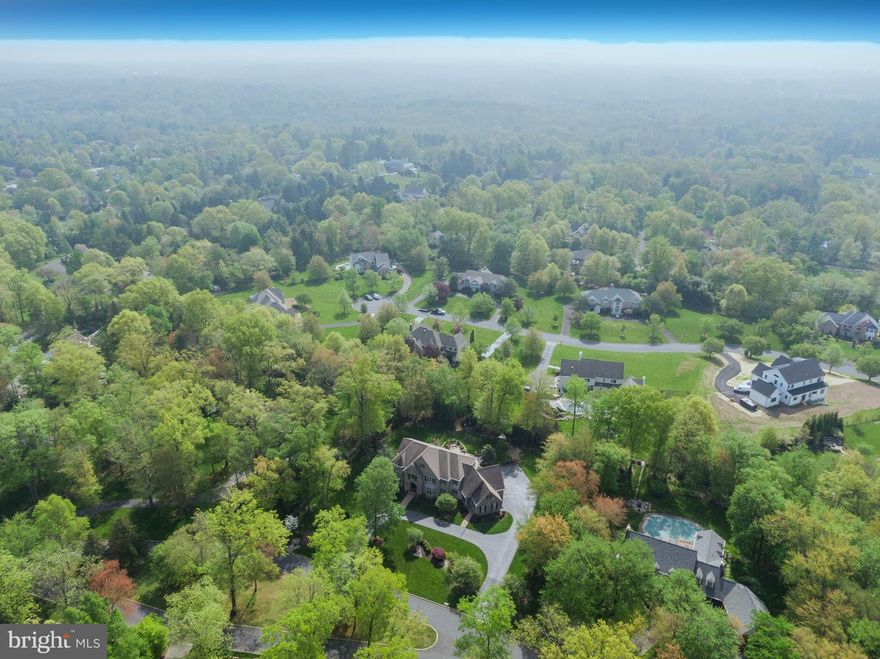 Meticulous Custom Built Lower Gwynedd Home, Only 16 Years Old, Beautifully Designed and Landscaped From Architectural Digest! This Prestigious, One-of-a-Kind Home is Situated on a Private Street & Has A Long List of Fabulous Upgrades and Features That Will Keep Your Head Turning; Total Finished Square Feet is 5,836 SF Included the Above Ground Lower Level; As You Approach This Home, Take In The Love and Attention to Detail to the Lush Landscaping of the Entire Exterior, Absolutely Breathtaking; Long Arching Circular Driveway with Large Parking Pad Off to the Right, In Front of the Oversized 3 Car Garage Designed For Privacy; Enjoy the Built-in Closets & Shelves in the Garage with Inside Access and Door to Backyard; Exterior Features Are Extensive Paver Rear Patio with Firepit Bench Seating, Timberlane Shutters, Custom Wood Doors, 400 Series Anderson Casement Windows, Waterfall Feature, Outdoor Surround Sound System, Tons of Trees & Shrubs for Ultimate Privacy, Perimeter Fencing, Fantastic Exterior Lighting, Gutter Guards, and Extra Wide Stairs to the WalkOut Basement! Beautiful Custom Arched Door and Doorway Welcomes You Into the Home; Two Story Foyer with 24 Inch Tuscan Tiled Flooring That Extends Into the Kitchen, Chandelier Lighting and Extra Wide Curved Staircase! Relax in the Living Rm/Music Rm with a Bow Window & Crown Molding; Dining Rm with Arched Entrance is a Good Size For Large Family Parties & Features a Tray Ceiling, Bow Window, Crown Molding and Tuson Faux Finishes; Amazing Gorgeous Kitchen with An Endless List of Features Including an Island with Unique Pendant Lighting, Convenient Butler Pantry, 6 Burner Stove with Pot Filler and a Custom Stone Hood, Custom Cabinets, a Wine Refrigerator, Cabinet Lighting, a Wet Bar, Breakfast Bar, Beveled Edged Granite Countertops, 2 Dishwashers, Under Counter Microwave and Custom Built-ins; Kitchen Sitting Area with a Beautiful Stone Fireplace with a Mantle From 1800’s Barn in PA, and Antique Wood Corbels From an 1800’s Barn in Lancaster; Large Breakfast Room with Steps to the 2nd Floor, a Built-In Desk and Oversized Sliding Glass Doors That Lead To a Beautiful Enclosed Porch Which Has Front Seats to the Beautiful Private Backyard and Access to the Back Patio; Family Room Features a Tray Ceiling, Custom Built-in Entertainment Center, a Spectacular Oak Fireplace which is a Re-Creation of a Stone Fireplace from Architectural Design; Large Home Office with Crown Molding and Powder Rm Just Outside the Door; Spacious Laundry/Mud Rm with Custom Cabinets, Granite Counters, Built-In Fridge, Access to Garage and An Exit to the Front; Completing the 1st Floor is a Full Bathroom with Custom Cabinetry, Tiled Flooring and Stall Shower; Now Onto the Second Floor! Spacious Master Bedroom with Custom Tray Ceiling, Separate Sitting Area, 2 Walk-in Closets with Incredible Built-ins; One of the Walk-In Closets is the Size of a Bedroom and was Custom Designed Instead of Having a 2 Story Family Room, a Great Trade Off, a Must See! Master Bathroom with Custom Cabinetry, a Walk-in Tiled Shower, Tiled Flooring, Dual Vanities, and Therapy Tub Simulator Whirlpool! Second & Third Bedrooms Are Good Sizes with Big Closets and Share a Jack & Jill Bath with Custom Cabinetry and Tile Floors; Fourth Bedroom Princess Suite with a WalkIn Custom Closet, and a Full Bath with Tiled Floors, Custom Cabinetry and a Stall Shower; Finished Walkout Lower Level with TV & Play Area, Bar, Workout Rm, Half Bath and French Doors to Steps Leading To The Backyard & Paver Patio; Also Huge Unfinished Storage Area with Tons of Shelving! Additional Upgrades Include a Home Security System, Dual Tankless Water Heaters, Dual Zone Heating & Air with Special Filters & Humidifier, Whole House Generator, Central Vac System, Recessed Lighting and Rounded Corners Throughout, Interior Speaker System, New A/C 2020, New Washer & Dryer 2021; Certified Pre-Owned Home Has Been Pre-Inspected, Report Available in MLS Downloads!