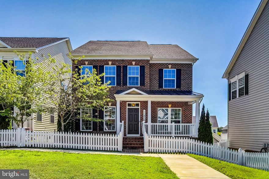 AWESOME -- 4 bedroom, 3.5 bath SF --  located in Clarksburg Village. This 4,000+ sq ft home features an open floor plan, large foyer and formal living room and dining room.  The huge gourmet kitchen showcases stainless steel appliances including a gas range and a pantry.  The kitchen opens up to a breakfast area and family room leading to a large balcony overlooking the rear yard.  Natural light pours in through the home highlighting beautiful hardwood floors throughout.  A half bath completes this level. Upstairs, the spacious primary bedroom features a large walk in closet and a luxury ensuite bathroom with a shower and a separate soaking tub. Three additional bedrooms each with their own closets and a full bathroom in the hallway share this second level. Laundry room with a full sized washer and dryer conveniently located on bedroom level. The walk-out basement is fully finished and includes a huge recreation room, home theatre and full bath.  Rear basement entrance leads to a detached 2 car garage. Great location just minutes to Clarksburg Premium Outlets, Harris Teeter, and Black Hill Regional Park. Conveniently located close to I-270.