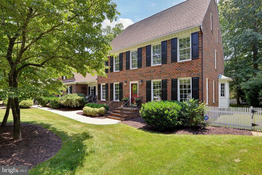 Custom built 4,167 square foot, 4-bedroom, 3.5-bath, all brick Colonial located in award-winning, gated Ford’s Colony community. Stunning eat-in chef's kitchen with custom cabinetry, granite, and stainless-steel appliances including six-burner, gas commercial range, built-in refrigerator and island with vegetable sink, microwave, and warming drawer.  The downstairs features formal living room and dining room, first-floor bedroom, full guest bath, spacious family room with gas fireplace, powder room, laundry, and hardwood floors throughout plus large sunroom with heated tile floors. The second-floor features large primary suite with large walk-in closet and private bath that features walk-in shower, and double vanity. Two additional bedrooms are located upstairs along with a full bath and bonus room with built-in wet bar and refrigerator. The exterior features a two-car oversized side loading garage, brick terrace, deck, and large fenced backyard. Home has updated kitchens and baths. Enjoy all the amenities that this highly desirable neighborhood has offers.