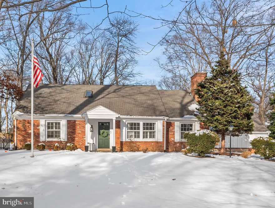 Perched on a corner lot in Radnor Township’s desirable Northwoods neighborhood, this recently renovated, light-filled three/four-bedroom Cape Cod style home boasts a new kitchen, upgraded lighting (including a Lutron® lighting system) fresh neutral paint, plus new and refinished hardwood flooring throughout. From the side driveway with two-car garage, a brand-new bluestone walkway leads to the front porch. Inside, the foyer opens to a large and sunny sunken living room with new oak flooring, plantation shutters, recessed lighting and a wood-burning fireplace flanked by custom shelving and cabinetry. Just beyond sits a bright and airy dining room with French doors opening to a rear terrace. Steps away you’ll find a brand-new kitchen (2023) with tasteful white cabinetry, quartz countertops and backsplash, higher-end appliances and direct access to the patio and fully fenced rear yard. Tucked away in a quiet corner of the main floor sits the primary suite complete with his and her closets, plantation shutters and an ensuite full bath with dual sink marble vanity and oversize glass door shower. Additional first floor highlights include an elegant powder room and a front bonus room that could easily function as a home office, fourth bedroom, gym or playroom. Skylights illuminate the gleaming hardwood staircase leading upstairs, where you’ll find two oversize secondary bedrooms each with walk in closets, a walk-in hall closet plus a neutral-colored full hall bath with new vanity. Back downstairs the finished basement offers more space for relaxation and play, plus an oversize laundry closet and additional storage area with shelving. Step outside and marvel at the private, fenced rear yard featuring a patio with retaining wall, storage shed with electric and ample flat greenspace. Current sellers completed many home improvements in their short ownership including the new kitchen, interior painting, new flooring, updated electrical including recessed lighting & new luxury lighting fixtures throughout, extensive exterior landscaping/removal of large trees, new AC condenser, epoxy garage flooring and more! Just minutes to downtown Wayne plus easy access to major roadways, King of Prussia, local parks and playgrounds. Make plans to tour this Main Line gem today before it’s too late!
