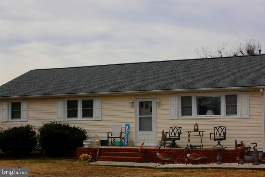 Charming cottage style rambler with water views in a country setting. This home offers room to spread out with a light filled family room addition.  The primary bedroom has a bathroom suite addition that includes a soaking tub and separate shower. The detached 2 car over-sized garage offers tons of storage. You don't want to miss this opportunity to see the well cared for home.
