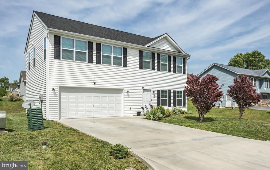 Don't overlook this stunning 4-bedroom, 2.5-bathroom home, meticulously crafted and completed in 2018. Upon entry, you're greeted by a spacious family room seamlessly connected to the upgraded kitchen, boasting a large island and dining area. The main level also offers a walk-in laundry room and half bath, with a sliding door leading to a sizable patio and backyard, perfect for gatherings with family and friends.

Upstairs, you'll find four generously sized bedrooms, including a primary suite featuring its own private full bathroom and walk-in closet, offering ample space and comfort.

Conveniently situated to the south of Martinsburg, this home ensures easy access to all directions for travel, along with a short drive to retail outlets, dining options, and numerous outdoor activities. Don't miss out – schedule your tour today!