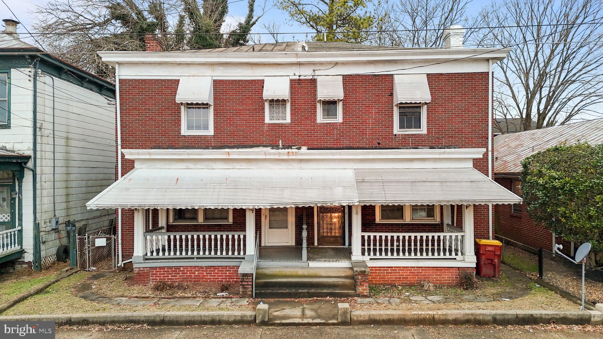 Discover a unique opportunity with this versatile property, zoned B-2, making it suitable for both commercial and residential use in the heart of Petersburg. Built in 1935, this two-story building seamlessly blends historic charm with modern enhancements—ideal for an office, barbershop, boutique retail space, or even a stylish urban residence.
Inside, you’ll find original hardwood floors that add warmth and character throughout. Recent upgrades include a newer HVAC system, 200-amp electrical panel, updated PVC plumbing, and a renovated upstairs bathroom. Efficiency improvements such as a moisture barrier, insulation, and windows (replaced in 2015) enhance comfort and value, with antique downstairs windows carefully restrung to preserve the property’s historic appeal.
The functional layout includes three rooms, one and a half bathrooms, a kitchen, and a laundry area—providing flexibility for a variety of uses, whether personal or professional. A durable metal roof ensures longevity and low maintenance. The property sits on a level lot and may be purchased individually or together with the neighboring property at 16 N South Street, offering expanded potential for dual occupancy, rental income, or business growth.
Don't miss your chance to own a distinctive property that combines timeless character with modern functionality—perfect for your next business venture or unique home. Schedule your private showing today!