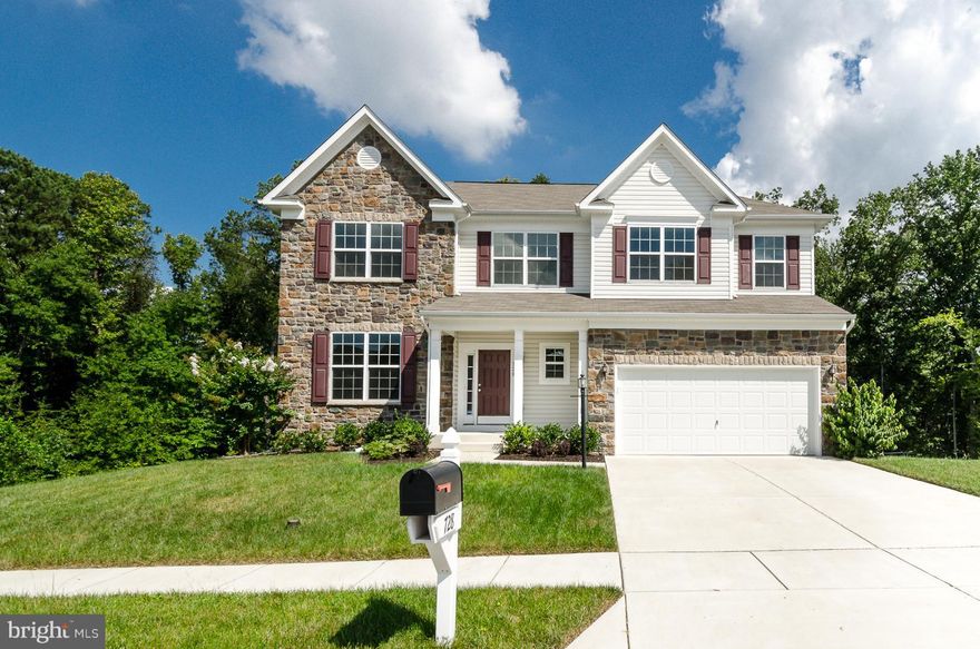 WOW GIANT PRICE REDUCTIION, READY TO MOVE IN! This 3 year young Colonial has all the features you are looking for! Open main level w/upgraded kitchen, morning room too! 4 spacious bedrooms up, finished lower level great for entertaining or in-law suite ready with 2nd kitchen, bedroom, full bath. Beautiful deck overlooking wooded area, very peaceful!