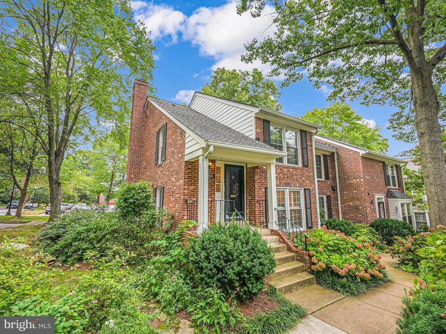 Welcome home to this beautifully maintained end-unit townhouse style condo, where modern comfort meets classic charm! Situated in a desirable neighborhood, this home offers an inviting layout perfect for both relaxing and entertaining. Step inside to find gleaming hardwood floors throughout the main level, providing a warm and elegant atmosphere. The living and dining areas are located off the entryway and offer soft natural light through multiple windows, creating a comfortable and warm space for gatherings with family and friends or unwinding after work. Rear family room features a brick front wood burning fireplace and overlooks the backyard. The kitchen features neutral toned cabinetry, modern stainless steel appliances, and a convenient oversized passthrough window to the family room, making meal prep a delight. Exit the cozy family room to a private patio in the fully fenced backyard, ideal for outdoor dining or simply enjoying a quiet moment. Upstairs, you’ll discover three bedrooms, including a master suite with a large closet and en-suite bathroom. The finished basement adds valuable extra living space with built in shelving on one side and additional cabinetry on the other, perfect for a home office, playroom, or media room. Additional full bath and den in basement offer plenty of room for versatile uses, this area is a true bonus. This lovely townhouse has newer carpet upstairs, newer trendy gray LVP flooring downstairs, and is freshly painted making this completely move in ready. Conveniently located near restaurants, commuter routes, and Arlington amenities and ready for you to make it yours!