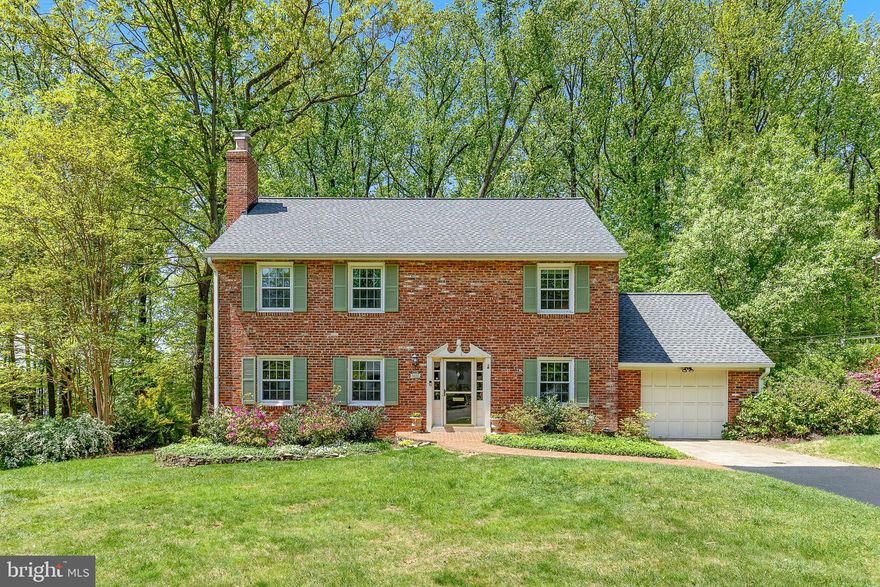 Annandale - Hillbrook Forest - Updated & Gorgeous 4BR/3.5BA  Colonial on Huge Lot! This beautiful 3-level home sits on over half an acre. Featuring hardwood floors throughout the main and upper levels, this home offers generous living spaces and thoughtful updates throughout.

The main level includes a bright, updated eat-in kitchen with granite countertops, an island, and stainless steel appliances. The kitchen connects to the attached one-car garage with convenient access to the back patio. This level also offers a spacious living room with custom-built-ins and a wood-burning fireplace, a formal dining room, an office/den, and a half bath.

Upstairs, the large ensuite primary bedroom includes an updated bath and two closets—one of them a large walk-in. Three additional bedrooms and a hall bath complete the upper level.

The finished lower level offers an expansive family room with a wood-burning fireplace and space for a game or pool table, a full bath, and a generously sized laundry and storage area.

The over half-acre lot boasts beautiful landscaping, a lush front lawn, and a private backyard with mature trees, flower shrubs, and a brick patio.  Major upgrades include new roof, siding, and gutters in 2024; a whole-house generator ensures uninterrupted comfort year-round.

Ideally situated just minutes to the heart of Annandale with loads of dining and grocery options. Easy access to Routes  495, 66, and 50 makes commuting a breeze. This home is also close to Mosaic District, Tyson's Corner, and Springfield. Don’t miss this exceptional home in sought-after Hillbrook Forest!