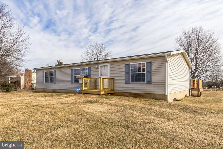 This spacious 4-bedroom, 2-bath modular home with 1st floor living, sits on a solid basement foundation and offers 1.27 acres of beautiful flatland. Inside, you'll find a bright and open floor plan with a well-equipped kitchen, comfortable living spaces, and all appliances included for added convenience.
The fully finished basement expands your living space with two additional rooms perfect for an office, guest space, or storage along with a massive game room ideal for entertaining. A full-house generator ensures uninterrupted power, providing peace of mind year-round.
Step outside to the back deck overlooking the property, where you can relax and unwind in the hot tub while taking in the peaceful surroundings. This home also features a brand-new roof on the home & shed, with  a leaf guard gutter system all backed by a lifetime warranty for worry-free maintenance.

Enjoy the privacy and space of country-style living while still being conveniently close to schools, shopping, and local amenities. This home is a must-see!