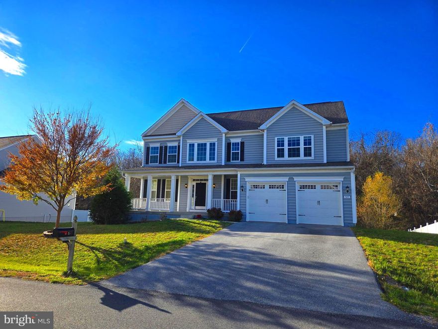 Rare opportunity to own in Jefferson County's desired SHERIDAN community! Whether commuting to Virginia, to Maryland, locally, or to nowhere at all, this home is convenient for every situation. Located just a minute off Route 340, enjoy the ease of heading to work, school, restaurants, or the grocery store! While at home, enjoy the serenity of your own large (.66 acre) lot, more than half of which is densely wooded. Peaceful views and relaxation await you from the new deck, overlooking the woods. Of course, the location isn't the only thing this home has to offer. With almost 5,000 square feet of living space, there is space for everything and everyone! Upon entering the home, the dramatic two-story foyer and second story overlook are the first things to meet the eye. The foyer also offers access to a private office, a half bathroom, and access to the mud room (with built-in) and the garage. Moving beyond the foyer, the ENTIRE rear of the main floor is a huge great room encompassing the kitchen, dining area, 20' x 12' sunroom, and living room. This room is massive and is wonderful for entertaining at the holidays or any time. The kitchen counters are draped in granite and the convenience of that TWELVE FOOT KITCHEN ISLAND! Upstairs are 4 generously-sized bedrooms and two full bathrooms. The owners' suite is especially large and features a large bathroom, as well, complete with separate soaking tub and oversized shower, water closet, and a double vanity. The owners' suite also offers TWO walk-in closets. The common bathroom upstairs also features and double vanity and EACH AND EVERY other bedroom on this floor also has a walk-in closet. Conveniently, the laundry area is also on this floor. As if all of this space wasn't enough, the fully finished basement just keeps the pleasant surprises coming. The basement offers a full bathroom, plenty more living room/family room/rec room space, a well-planned location to install a projector, a 5th bedroom, and a new quartz-topped wet bar with refrigerator. Additionally, there are plenty of windows, so even the basement is well-lit. Even this level has a view of the trees behind and walks out level to the rear yard, too. It may be hard to notice, but upon looking in the mechanical room, take notice of the new double water heaters and heat pump (all replaced in Summer 2024). If you've been waiting for just the right thing to hit the market, wait no more, this is it! Make this home YOUR home! IF YOU LIKE WHAT YOU SEE, CALL       !!!!!