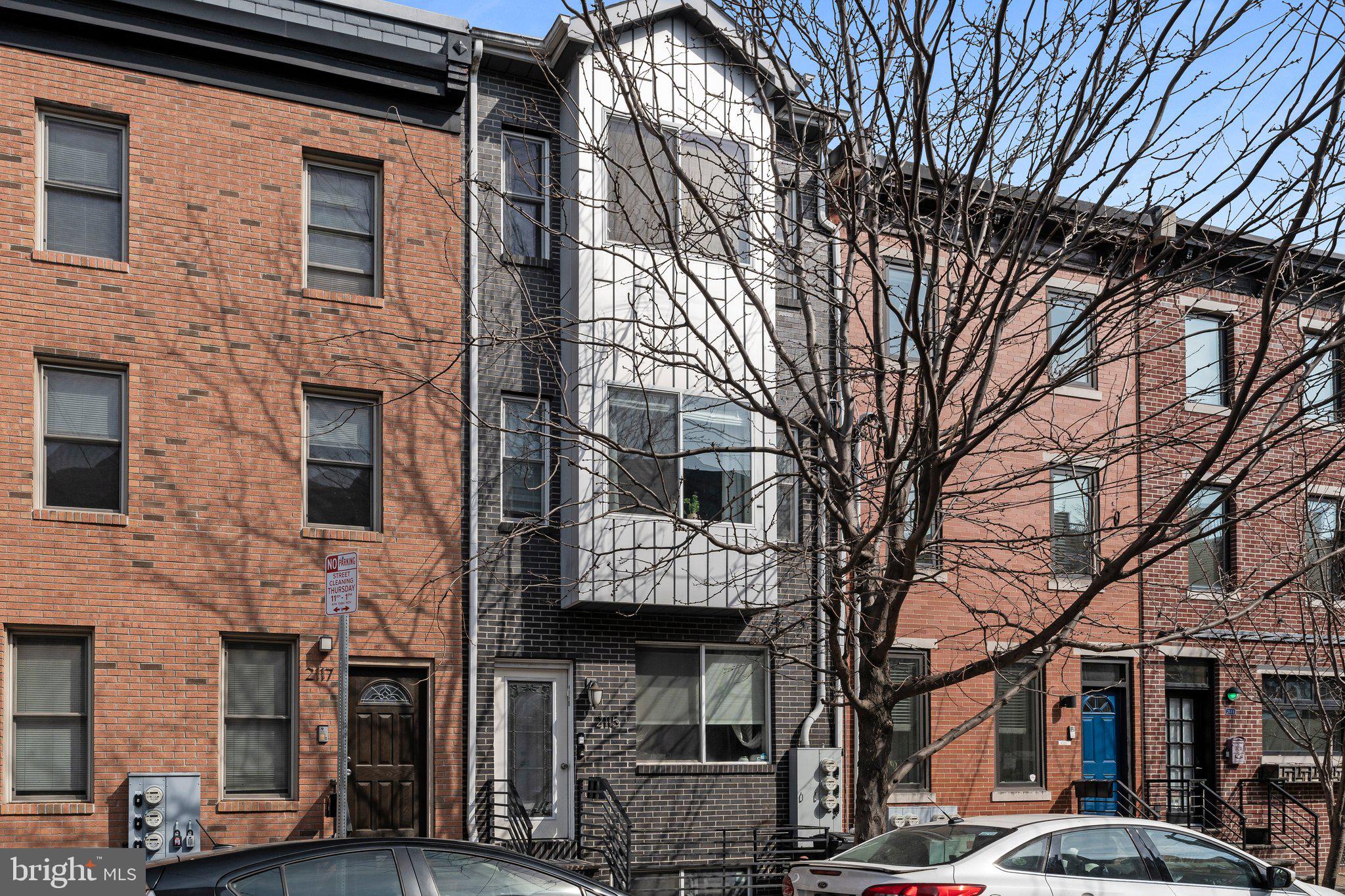 Welcome to 2115 Carpenter St #1, a beautifully designed bi-level condo in the heart of Graduate Hospital! This spacious 3-bedroom, 2-Full bath home offers the perfect blend of modern comfort and city living. Step inside to discover an open-concept main level featuring hardwood floors, high ceilings, and a sleek kitchen with upgraded countertops, stainless steel appliances, and an oversized island perfect for entertaining. The first floor has a large bedroom that walks out to the sizable back patio. Enjoy your private outdoor space—perfect for morning coffee or evening relaxation. This bedroom could double as an office. The lower level boasts two generously sized bedrooms with a full hall bathroom, plus a separate laundry area and ample storage throughout. Just steps from restaurants, coffee shops, parks, and everything Center City has to offer. Low condo fees make this home a smart move. Don’t miss this opportunity to live in one of Philly’s most desirable neighborhoods!
