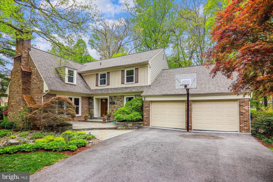 Nestled within the treasured community of Fallsreach on a small cul-de-sac backing to Watts Branch Park, this classic Mitchell & Best built Colonial with 5 spacious bedrooms and 4.5 bathrooms has been lovingly renovated, updated and cared for by the original owners.  

The inviting warmth and love bestowed is palpable upon entering the large foyer. The sunlit living room offers comfortable elegance with its fireplace with marble surround and the dining room provides plenty of space for gracious entertaining or casual feasts.  The kitchen will impress all chefs with striking black countertops, eye-catching backsplash, beautiful cabinetry, gas cooktop, stainless steel French door refrigerator with bottom freezer and in-door water and ice dispenser, double wall oven and a sunny breakfast area with bay window.  Off the kitchen is a fabulous den area with access to the expansive rear deck and clutter-managing built-in corner desk, absolutely perfect for all those papers that tend to accumulate on the kitchen table. The family room, open to the kitchen, and with another access to the deck, will have everyone gathering comfortably and companionably around the beautiful stone fireplace and wet bar.  There’s also a well designed office with double-door entry, built-in desk, cabinets and bookcases for private or work from home time.   Completing the perfect main level is the discreetly placed powder room and a mudroom with coat rack, coat hooks and lots of shelving just off the 2 car garage.

Upstairs is ideal with 4 spacious bedrooms and 3 full bathrooms, including the beautiful, bright primary suite with ceiling fan, built-in dressers and shelving and a spa-like private bathroom with 2 vanities, relaxing tub and separate shower plus a second bedroom with private bath. For your convenience, you’ll also find the laundry room with countertop and cabinets on the bedroom level.

The finished walkout lower level has all the space you need for continuing the festivities or hosting more overnight guests with its large recreation room, the 5th bedroom, a full bath, a bonus room and tons of storage space.

The location of this beloved neighborhood in the Churchill school district is unbeatable with its proximity to several parks, places of worship, shopping and dining venues plus multiple commuter routes that will get you anywhere you want to go.