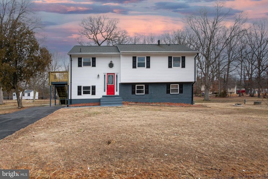 Welcome to this move-in ready split foyer that's in fantastic condition and located in Pomfret Estates. It's one of the largest lots on Preston Lane with .75 acres of level space for a garden, playground, and plenty of outdoor fun. The house has been beautifully and tastefully updated for chic and modern living. The open concept features glistening refinished hardwood floors upstairs and waterproof luxury vinyl floors in the basement. 3 nice sized bedrooms with access to the full bathroom from the primary bedroom. Nice sized closets in each bedroom. The gourmet kitchen has new sleek contemporary cabinets, quartz countertops, stainless steel appliances and flows freely through the dining and living room areas. In the basement you can cozy up next to a wood-burning fireplace on chilly evenings; take care of all your laundry needs with a brand new washer and dryer in the separate laundry/mechanical room; plus a 1/2 bathroom and additional space for a home office, and still plenty of open space for you to style and design a more captivating living space. Step outside the walkout basement to the lovely expansive backyard with a patio and large storage shed. You will also see stairs leading up to a small deck landing with entry into the kitchen. This is a great location close to parks, schools, and not too far from Waldorf and La Plata shopping and dining; and convenient to major commuter routes and military bases. Seller prefers Southern Maryland Title in La Plata. Call me today to schedule a tour.