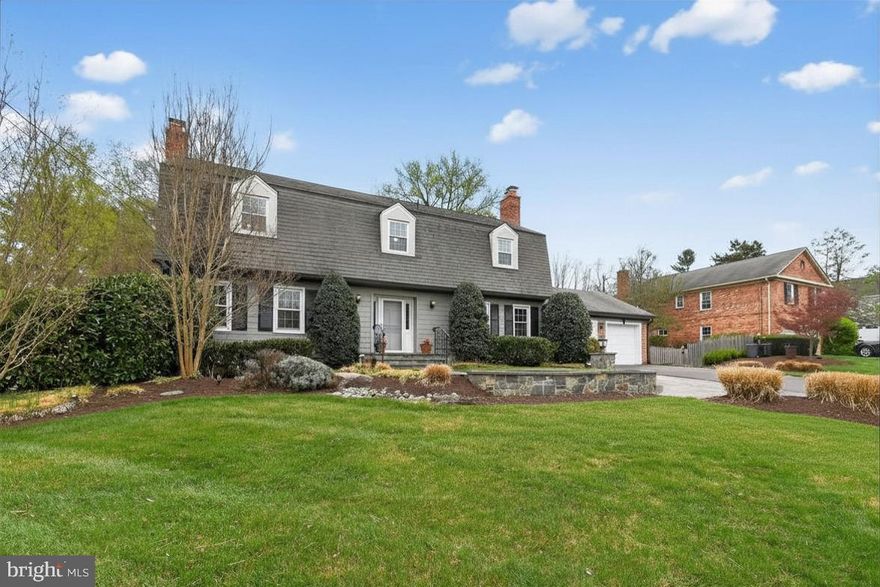 OPEN SATURDAY, 4/11, 2-4PM AND SUNDAY, 4/12, 1-3PM. Welcome to 9325 Renshaw Drive, a handsome Colonial in a premier Bethesda setting, offering 5 bedrooms, 4.5 baths, and beautifully curated living spaces across three finished levels. Designed with timeless elegance and modern functionality, the main level showcases a gracious formal living room with fireplace, an elegant dining room ideal for entertaining, and a private office or library.

The heart of the home is a stunning open-concept kitchen featuring stainless steel appliances, double wall ovens, granite countertops, an expansive pantry, and a sunlit breakfast area. The adjoining great room, anchored by a fireplace and custom built-ins, opens seamlessly to a charming screen porch and an impressive stone patio, creating a true indoor-outdoor lifestyle experience. A well-appointed mudroom and attached two-car garage provide everyday ease.

Upstairs, the luxurious primary suite offers a serene retreat with a spacious walk-in closet and spa-inspired bath. A secondary bedroom with ensuite bath, along with two additional generously sized bedrooms and a third full bath, complete the upper level.

The fully finished lower level is designed for both relaxation and recreation, featuring a cozy living space with fireplace and wet bar, a 5th bedroom, full bath, gym or flex space, office nook, and laundry room.

Set on a beautifully landscaped lot with mature trees that backs to greenspace and woods, the expansive flat backyard is a private oasis with a sprawling stone patio, multiple seating areas, and built-in outdoor BBQ, perfect for entertaining or quiet evenings at home. Mature gardens in the front and back of the property, including hardscaping, lighting, and an irrigation system complete the outdoor space.

Rich hardwood floors, crown and custom moldings, custom built-ins, and thoughtful architectural details throughout elevate the home’s timeless appeal.

Ideally located near premier shopping, dining, parks, and commuter routes, including Westfield Mall, Wildwood Shopping Center, Cabin John Regional Park, and in the sought-after Whitman school district.