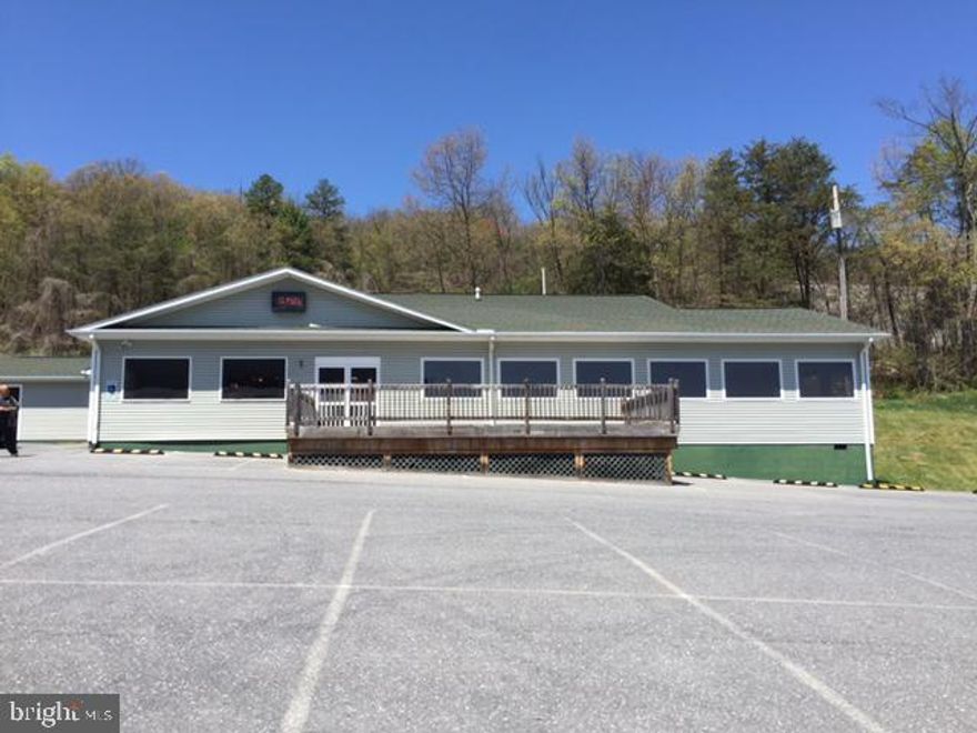 Restaurant / bar / flex building for rent w/ efficiency apartment / office PERFECT LOCATION: Right on busy highway, close to many vacation rentals, and heavy traffic. Flexible use for any type of tenant. Asking the listing contact for additional details about this opportunity. Fully equipped ready to open: All seating and kitchen equipment is available for new owner. Spacious seats over 150 guests 4 areas for seating including bar Breath taking 360 degree mountain view's (location is right on top of the hill) Parking over 45 vehicles with great highway and view frontage. Parking lot suitable for out door cooking and events. Other features include: Walk in fridge / freezer Patio Deck for outdoor dining and enjoying amazing view Small Apartment / office attached with full bath and 1 br Located right on US HIGHWAY 211 Plenty of traffic exposure and located near tourist attraction Luray Caverns

Lease rate does not include utilities, property expenses or building services
Currently Built Out as a Restaurant or Café Space
Central Air Conditioning
Kitchen
Private Restrooms
Corner Space
High daily foot traffic from Lee Highway.