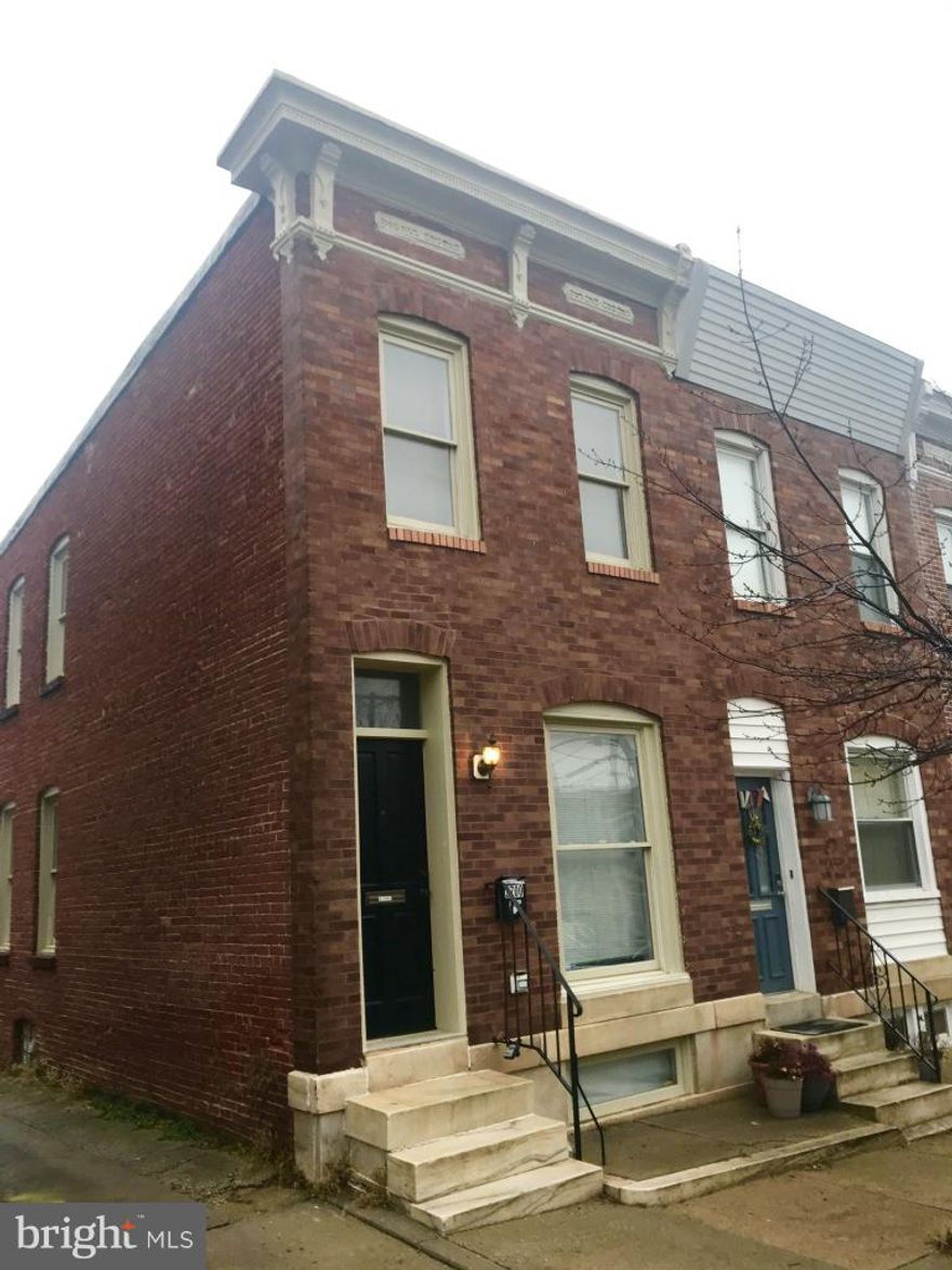 Perfect 2 bedroom 2.5 bath row home 1 block from Patterson Park.  End of group with tons of natural light!  Updated kitchen with granite and stainless along with room for a table.  Hardwoods throughout upper levels, two full baths upstairs and powder room on main level.  Rear parking pad for large vehicle and basement with family room, laundry and storage.  All freshly painted and ready for move in!!!  Super close to JHH