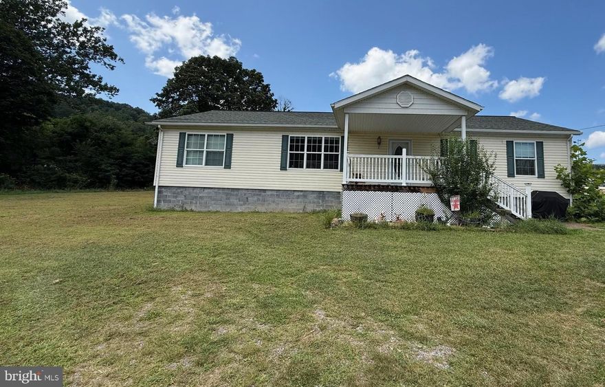 Nestled in the charming Circleville community, this delightful modular home offers a perfect blend of comfort and modern living. Built in 2014, this residence boasts an excellent condition and features a thoughtful open floor plan that invites warmth and togetherness. Step inside to discover a spacious interior adorned with recessed lighting and ceiling fans, creating a cozy atmosphere throughout. The heart of the home is the country-style kitchen, complete with an island and ample table space, perfect for casual dining or entertaining guests. Equipped with modern appliances, including a self-cleaning oven, built-in microwave, and dishwasher, this kitchen is both functional and inviting. Retreat to the serene primary suite, featuring a luxurious bathroom with a jetted tub and walk-in shower, providing a spa-like experience at home. Additional bedrooms and bathrooms are thoughtfully designed to accommodate various needs, ensuring comfort for all. The exterior of the home is equally impressive, set on a generous 1.15-acre lot that offers a cleared, level landscape with beautiful views of the surrounding mountains and woods. Enjoy the tranquility of rural living with the convenience of year-round access. The property features a well-maintained gutter system and a spacious deck, perfect for outdoor relaxation or entertaining under the stars. Parking is a breeze with a private driveway that accommodates multiple vehicles, ensuring ample space for guests. The corner lot provides additional privacy and a sense of openness, making it a perfect retreat. Living in Circleville means enjoying the benefits of a close-knit community. The neighborhood is known for its friendly atmosphere. With the elementary school nearby and a commitment to community services, this home is not just a place to live; it's a place to thrive. Experience the perfect blend of comfort, convenience, and community in this inviting Circleville residence.