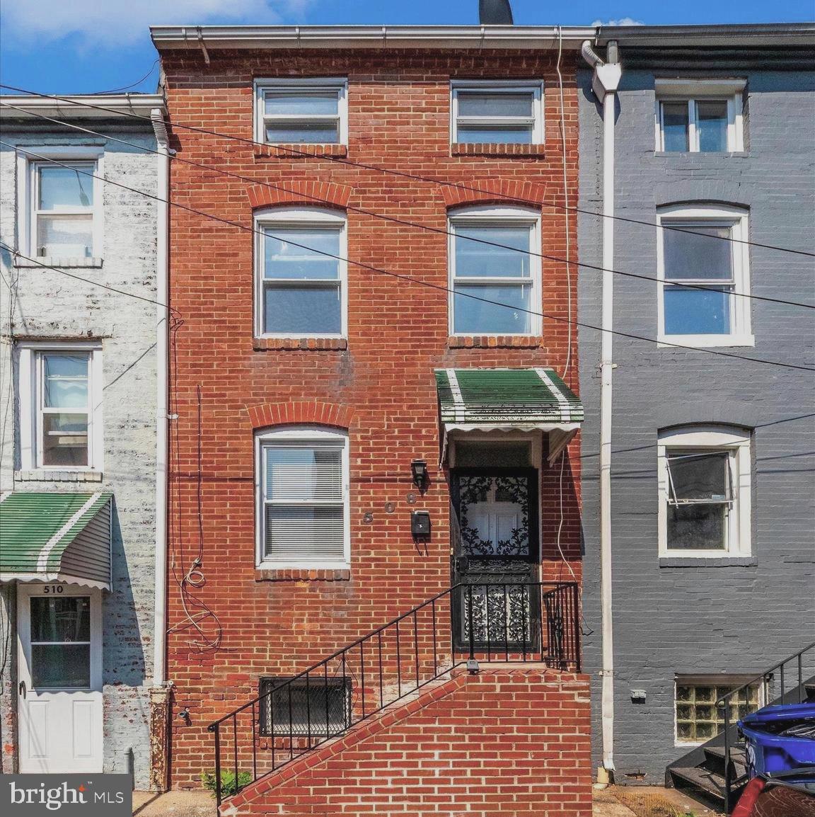 Really great living space for the price ! 3 full baths! 0% down financing available for qualified non investors.
Welcome to this charming row home in the heart of Pigtown, just minutes from Baltimore's Inner Harbor, local colleges, and the stadiums! With 4 bedrooms and 3 full bathrooms—one on each level including a finished basement—this home offers flexible living space ideal for both homeowners and investors.
Recently updated with fresh paint and stylish flooring, the home blends modern touches with original character, featuring exposed brick walls and a spiral staircase that adds a unique architectural flair. Enjoy outdoor living in the private, fenced-in rear patio—perfect for entertaining or relaxing. Whether you're looking for a comfortable primary residence or a high-potential rental property, this home checks all the boxes. Don’t miss your opportunity to own a piece of vibrant, growing Pigtown!