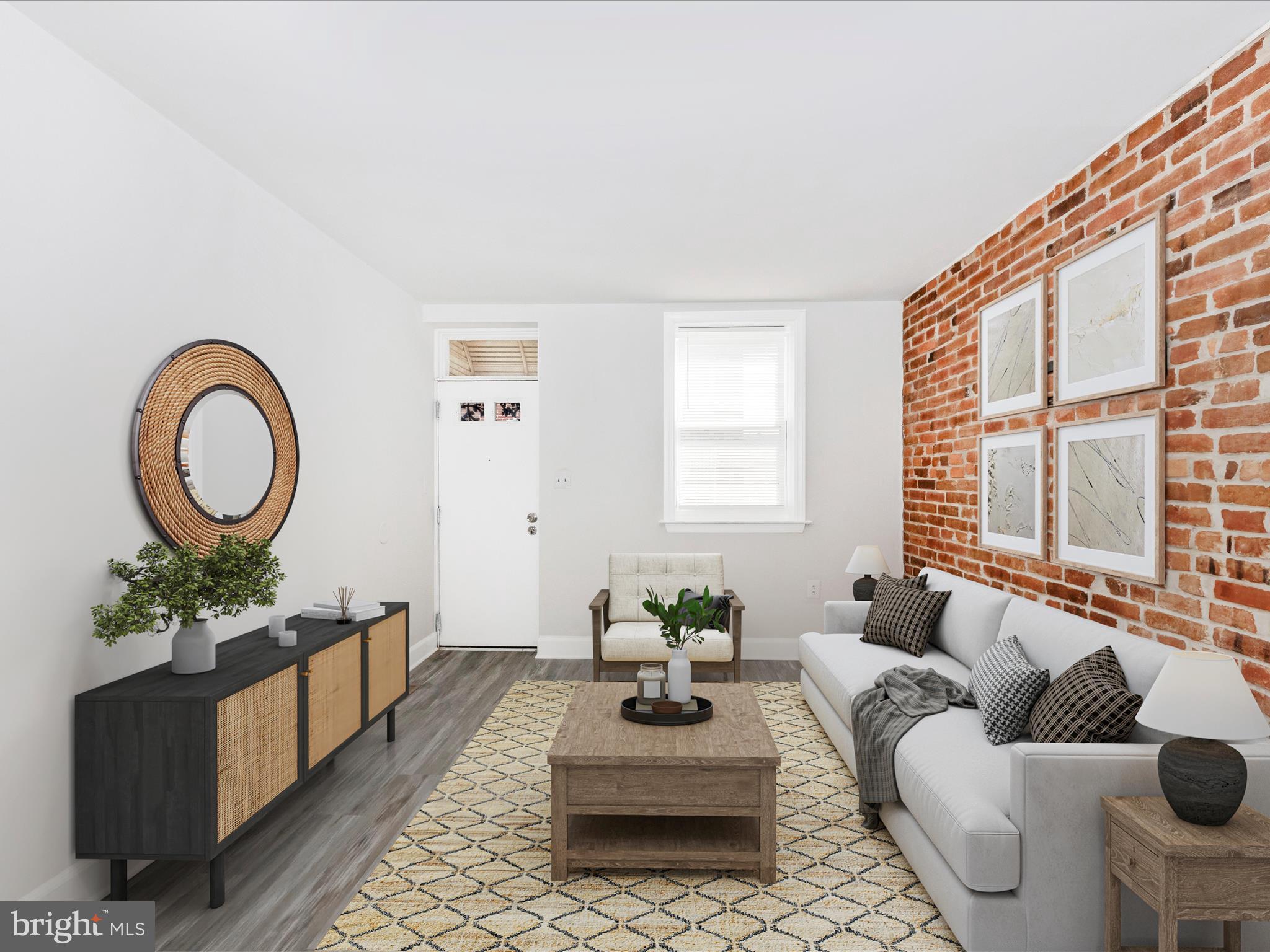 Really great living space for the price ! 3 full baths! 0% down financing available for qualified non investors.
Welcome to this charming row home in the heart of Pigtown, just minutes from Baltimore's Inner Harbor, local colleges, and the stadiums! With 4 bedrooms and 3 full bathrooms—one on each level including a finished basement—this home offers flexible living space ideal for both homeowners and investors.
Recently updated with fresh paint and stylish flooring, the home blends modern touches with original character, featuring exposed brick walls and a spiral staircase that adds a unique architectural flair. Enjoy outdoor living in the private, fenced-in rear patio—perfect for entertaining or relaxing. Whether you're looking for a comfortable primary residence or a high-potential rental property, this home checks all the boxes. Don’t miss your opportunity to own a piece of vibrant, growing Pigtown!