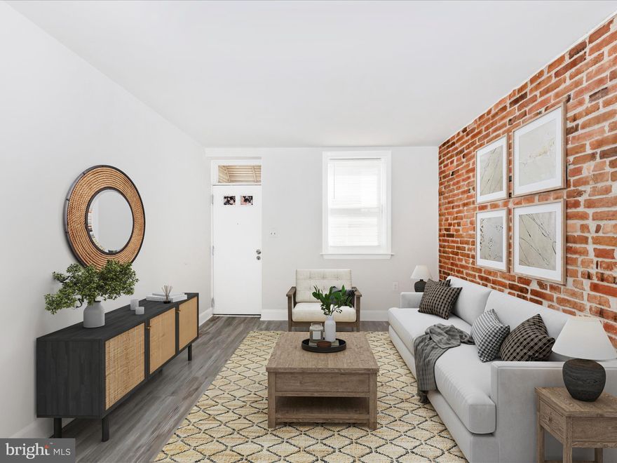 Really great living space for the price ! 3 full baths! 0% down financing available for qualified non investors. Investors looking for a rental- this property has 1 bathroom on each upper floor and one in the basement . So you can rent rooms with their own bathrooms. 
Welcome to this charming row home in the heart of Pigtown, Just minutes from Baltimore's Inner Harbor, local colleges, and the stadiums! With 4 bedrooms and 3 full bathrooms—one on each level including a finished basement—this home offers flexible living space ideal for both homeowners and investors.

Recently updated with fresh paint and stylish flooring, the home blends modern touches with original character, featuring exposed brick walls and a spiral staircase that adds a unique architectural flair. Enjoy outdoor living in the private, fenced-in rear patio—perfect for entertaining or relaxing. Whether you're looking for a comfortable primary residence or a high-potential rental property, this home checks all the boxes. Don’t miss your opportunity to own a piece of vibrant, growing Pigtown!