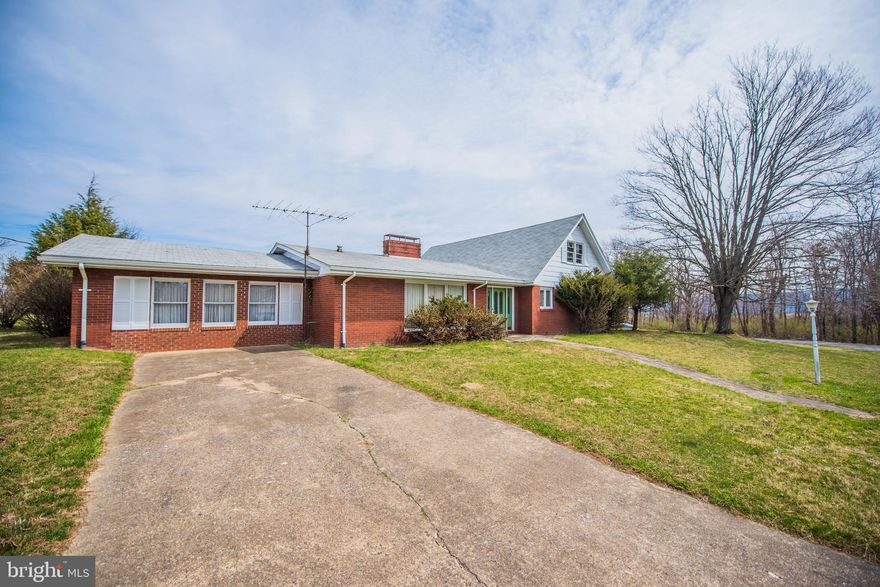 ONE LEVEL LIVING!  Spacious brick rancher with one level living. Living Room with wood burning Fireplace for those cool winter evenings.  Kitchen/Dining room combo with a 2nd wood burning Fireplace, a breakfast nook off the kitchen, as well as 3 spacious bedrooms and 2 Baths.  Spacious Family Room for overflow guests plus large Sun /Florida room, perfect for enjoying the different seasons while relaxing indoors.  The family room and sun room are a perfect substitution for a basement, but with no steps to navigate. Fronting County road for easy access and located just minutes from the intermediate and middle schools. Nice level lawn with off street parking. Recent upgrades include new ceramic tile in both bathrooms,dishwasher, refrigerator,  recently installed roof and Heat/AC system.