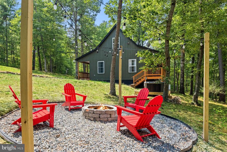 Newly-renovated cabin in Bryce Resort! Beautiful vinyl plank flooring, open kitchen, central HVAC, screened-in porch, expansive deck and a huge yard with large fire pit. Professionally designed with all new furniture, modern decor, and hot tub.  As a vacation rental it has generated $42,000 over the past 13 months, and can come with an existing property manager and cleaner. Hot tub and furniture optional, available for purchase.  See seller docs for a summary of rental history and financials. $1,000 buyer credit if you continue using the same property manager.  Perfect vacation home or investment property!