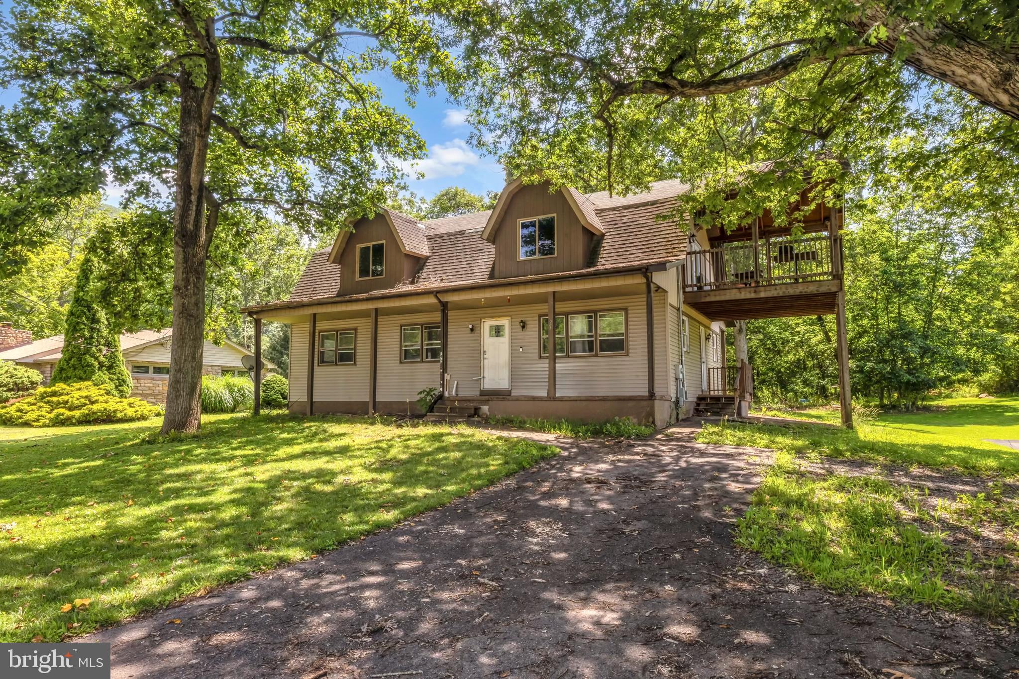 Opportunity knocks with this one-of-a-kind LaVale home—an architectural standout ready for your vision and updates.
With over 4,300 square feet of living space, this fixer-upper offers a rare chance to restore and transform a truly unique property. A standout third-floor family room and elevated deck provide sweeping views of the surrounding landscape—features not often found in the area.
Inside, you'll find spacious, light-filled rooms and original design elements just waiting to be brought back to life. The home needs repairs and updating throughout, but it offers solid bones and incredible potential for those ready to invest some work.
Step outside and enjoy the peaceful setting—just down the street, a quiet creek offers a serene natural escape. The large backyard is ideal for relaxing, entertaining, or creating your dream outdoor space.
Set in a quiet, established neighborhood, you’re only minutes from shopping, dining, and the natural beauty of Western Maryland.
This is more than just a home—it’s a renovation opportunity with unlimited upside. Whether you're an investor, flipper, or a buyer looking to build equity through improvements, this property is a must-see.