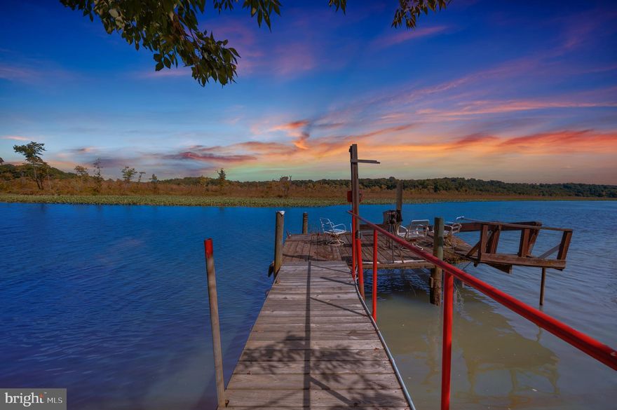 Welcome to your one-of-a-kind waterfront retreat nestled in the heart of Stafford County. This exceptional property offers a rare opportunity to own not just one, but three lots sold together, totaling an impressive 16.87 acres of pristine land. 

Tax ID 30----154C (0.455 Acres): The perfect starting point for your escape.
Tax ID 30----167 (15.4 Acres): A vast expanse of land, providing endless possibilities for development or enjoyment. There is an existing well on this property. 
Tax ID 30----165 (1.02 Acres): A coveted waterfront lot spanning 1 acre along the picturesque Aquia Creek, offering stunning views and direct access to the water.

This property offers breathtaking panoramic views of Aquia Creek that will leave you in awe. Imagine waking up every morning to the tranquil sounds of nature and enjoying your coffee on the porch overlooking the water. With a short boat ride to the Potomac River, you'll have endless opportunities for water-based activities right at your fingertips. Boasting a charming gazebo and dock, providing the ideal setting to relax and unwind amidst the tranquil surroundings. There is also a spacious barn, perfect for storing all your outdoor equipment or converting into a workshop. 

Nestled in a serene setting, it offers ample space and scenic surroundings, making it ideal for a horse farm with plenty of room for grazing and riding. Whether you're looking for a spot to park your RV, set up camp, or create a beautiful equestrian retreat, this property offers endless possibilities for outdoor enjoyment. If you're seeking a weekend retreat, a permanent residence, or envisioning a great family subdivision, this property ticks all the boxes. Don't miss out on your chance to own your slice of paradise