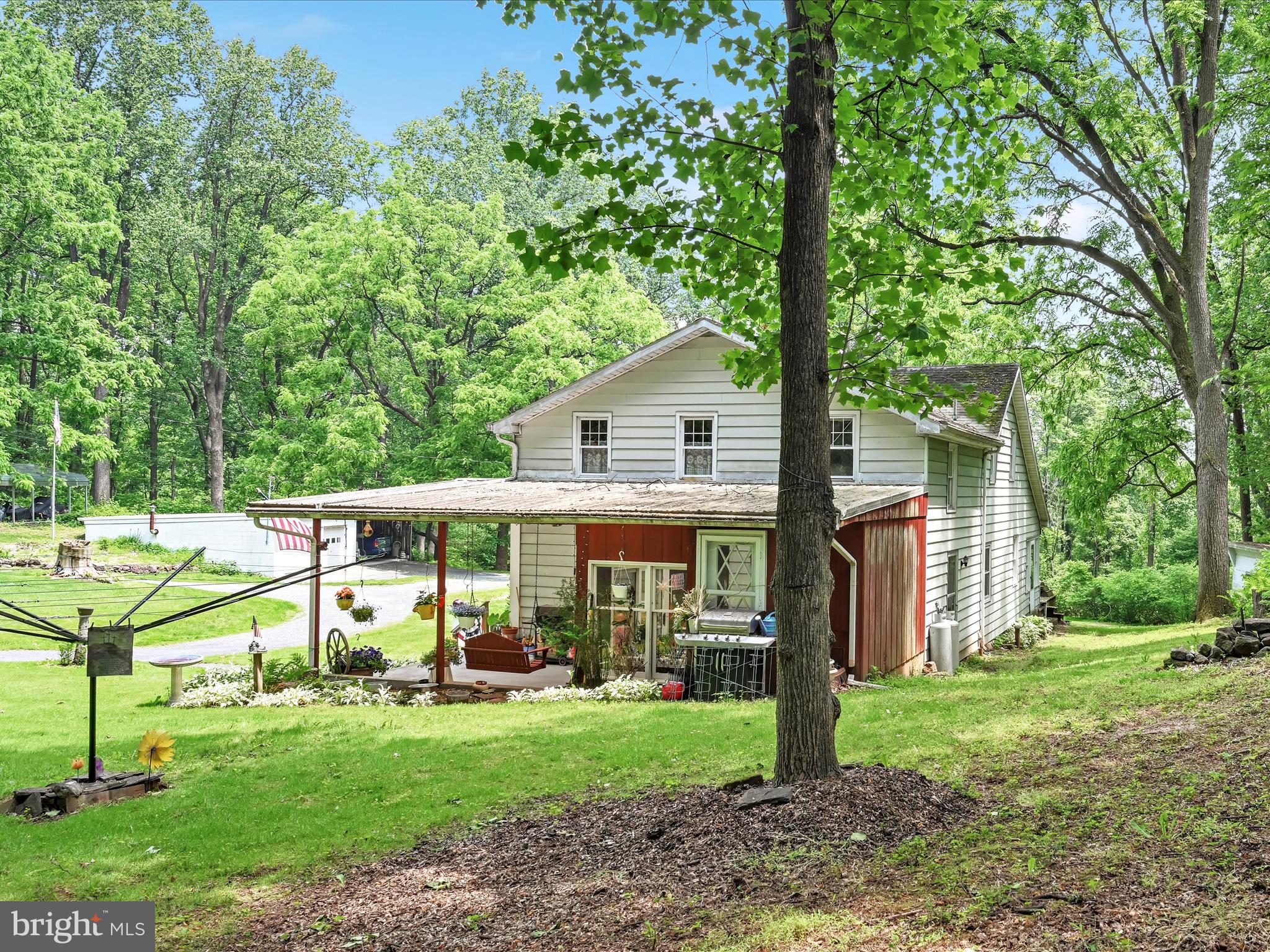 Public Auction Saturday, July 12, 2025 @ 12 Noon - Open House Saturdays June 21 & June 28 from 1-3 PM - Successful bidder required a 10% non refundable deposit, settlement within 45 days - Buyer pays the 2% RE transfer taxes - List price does not reflect the final sales price * Secluded 6.87 acre property with a 4 bedroom, 1 1/2 bath cape cod - 1,820 sq ft living area - Eat in kitchen, living room w/exposed beams, stone fireplace w/woodstove insert, laundry room w/half bath - Second floor has 4 bedrooms and full bath - Enclosed side porch w/closets and enclosed front porch, deck - Full basement - Detached 28x28 block 2 car garage w/26x26 lean to - This property boasts a very desirable private setting midway between Schaefferstown & Brickerville - With some TLC, this will make a very charming home - All on 6.8 acres of a level to gentle slope topography which is partially wooded, home to deer and turkey - Proximity to Routes 501, 322, 897 & 419