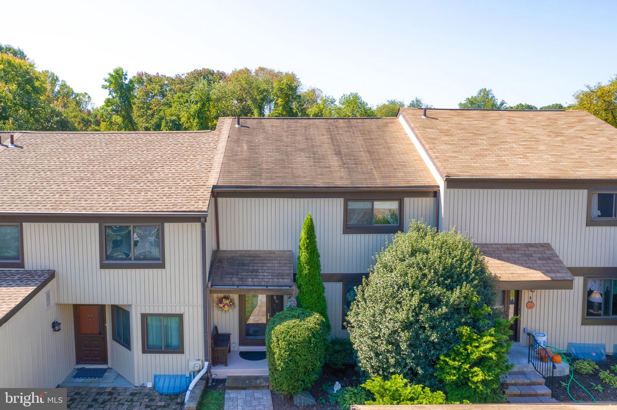 Enjoy maintenance free living in this wonderful community surrounded by mature trees and open space. Located within minute from major thoroughfares, parks, shopping and recreation,  all while being tucked away in a very private setting. This home has been lovingly maintained throughout the years. Features include eat-in kitchen, dining room with sliders to a covered patio, living room and powder room, finished basement with laundry and storage area, three nice size bedroom and two full baths complete this townhome. Don't delay!