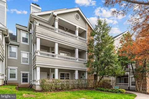 Photo of 13058 Autumn Woods Way #105, FAIRFAX, VA 22033 (MLS # VAFX2297944)