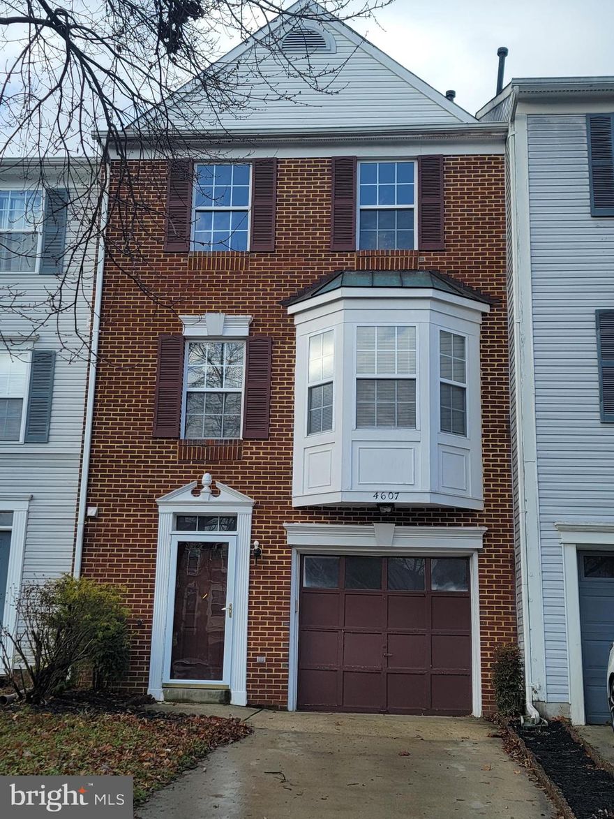 Light-filled, well-maintained 3BR/2.5BA brick front 3-level townhome.  Features include:  Lots of space; eat-in kitchen; separate dining room; gas fireplace in family room;  master bedroom with large soaking tub and separate shower, walk-in closet; and 1-car garage.  Close to shops, public transportation and Routes #301, #495 and #202.  New roof in 2023.  Currently tenant occupied.  Schedule showing with 3 hours notification.