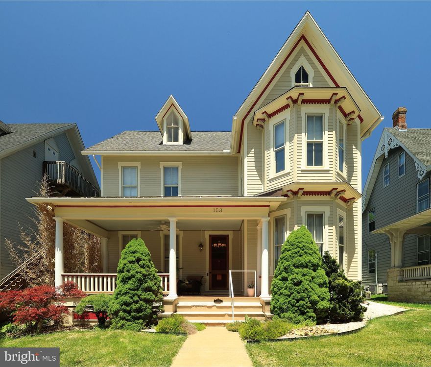Located along one of Historic Bellefonte’s most beloved streets, this stunning Victorian on E. Linn Street captures the elegance, architectural beauty & rich heritage that define the neighborhood. Framed by mature trees & classic sidewalks, the home feels beautifully woven into the fabric of downtown Bellefonte, where every porch, turret & period detail tells a story.  From the moment you arrive, the inviting covered front porch & striking exterior welcome you into a residence filled with character & warmth. Inside, yesteryear's nostalgia blends seamlessly with thoughtful modern updates, creating a setting that feels both enduring & refreshingly livable. Soaring 11’ ceilings on the main level, 10’ ceilings on the second floor, gleaming hardwood floors, oversized replacement windows, detailed moldings, hidden doors & elegant fireplaces showcase the home's remarkable history, while carefully selected improvements provide the conveniences today's lifestyle demands.  Sunlight streams through expansive windows, highlighting the distinctive features found throughout. Just inside, you are greeted by a gracious foyer & grand hardwood staircase. Formal living & dining rooms provide refined spaces for hosting family & friends, while one of the home's most delightful surprises awaits beyond a concealed door a cozy den with radiant floor heat, ideal for a home office, reading room, or quiet retreat.  A sunken family room offers a welcoming gathering space, while the beautifully updated kitchen serves as the heart of the home with maple cabinetry, granite countertops, an impressive 8-foot center island & a generous walk-in pantry.  Upstairs, the owner's suite provides a peaceful sanctuary complete with 2 walk-in closets & a private bath featuring dual vanities, a walk-in shower & a Jacuzzi tub. An additional bedroom with its own walk-in closet & private full bath, second-floor laundry, central vacuum system, natural gas forced-air heat, central air & an on-demand natural gas water heater further enhance everyday living.  Step outside to enjoy the rear paver patio & expansive deck, perfect for summer entertaining or relaxing evenings outdoors. The detached two-story, three-car garage located along Church Alley provides exceptional parking & storage seldom found in downtown Bellefonte. Vinyl & wood siding (painted in 2025) contributes to the home's outstanding curb appeal.  Adding to the property's versatility is a separately addressed yet attached one-bedroom apartment. Featuring its own private entrance, natural gas forced-air heat, central air, kitchen, living room, bedroom, full bath, and included appliances, the apartment currently holds a rental permit, creating an outstanding opportunity for supplemental income, multi-generational living, or guest accommodations.  Offering approximately 3,308 square feet & a rare blend of historic sophistication, modern amenities & income-producing potential, this exceptional Victorian presents a unique opportunity to own a treasured piece of Bellefonte history while enjoying a vibrant downtown lifestyle just moments from local shops, restaurants, parks & community events.