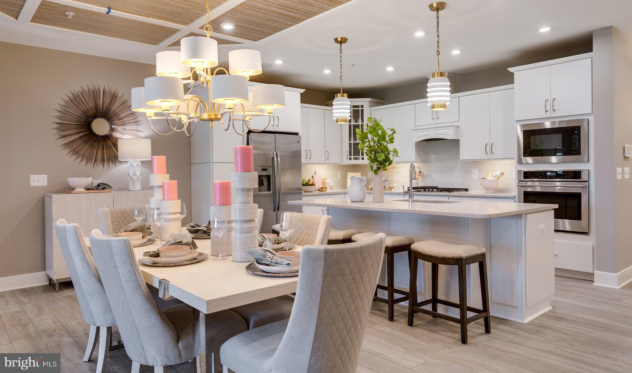 This Chester home design is a quick move in home and features 2 bedrooms, 2.5 baths, a home office with french doors and a personal balcony. The building has elevator access, keypad entry, 1 car garage and secure storage room per unit. Call today to find out the details and start living the life you want!
Welcome to K. Hovnanian's Four Seasons at Kent Island a new luxury active adult 55+ community on Maryland's Chesapeake Bay. Discover the amenity-filled, resort-style experience within 45 miles of Washington DC and Baltimore. Residents can soon take advantage of the community's 24,000 sq. ft. clubhouse, indoor & outdoor pools, a state-of-the-art fitness center, and multiple tennis and pickleball courts. With a full-time lifestyle director on site, Kent Island also features a well-maintained calendar of activities such as walking club, indoor and outdoor yoga sessions, mahjong club, kayaking, pickleball and more. Kent Island life is about making friends and enjoying the company of people who have worked hard and now want to enjoy all that a luxury 55+ community has to offer. Located steps from the water and minutes from Annapolis, Four Seasons at Kent Island also offers quick access to Rt. 50. Enjoy the convenience of nearby dining and shopping options together with the quaint charm of a small town.