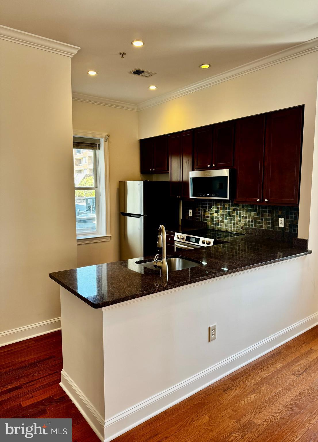 1229 12TH STREET NW 210