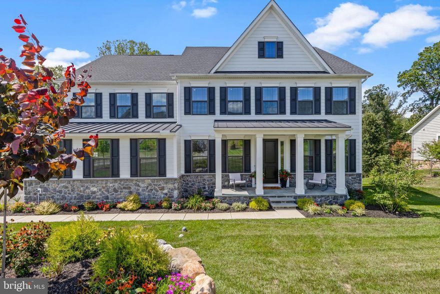 Nestled in the sought after Greystone community, this well maintained and fully upgraded home embodies the vibrant lifestyle this neighborhood offers. Situated on a premium lot on the top of a quiet street, this home has all the right spaces, high quality appointments, easy flow, and beautiful wooded views that invites you to “come on in and stay awhile.” 
Rich hardwood floors grace the main level, which includes a private first-floor bedroom with an ensuite, perfect for guests or in-laws. The upgraded chef's kitchen is a culinary dream, featuring high-end stainless steel appliances, quartz countertops, ample cabinet space, a walk-in pantry, and a spacious eating area. Oversized windows throughout the home flood each room with natural light. The kitchen seamlessly flows into the family room, complete with a cozy slate fireplace. This Marymount model includes a spacious dining room and first floor library/office with built-in bookcases. Upstairs, you will find four large bedrooms with three full baths and laundry room.  Second floor bedrooms include a primary suite, a princess suite with private bathroom, and bedrooms 3 and 4 sharing a Jack and Jill bathroom.  The primary suite is a true retreat, offering a separate sitting area, two expansive closets and a dramatically upgraded bath with a walk-in shower. The home offers wonderful closet and storage spaces throughout.
The fully finished walkout basement, featuring a sixth large bedroom with walk-in closet and a full bathroom adds tons of extra living space. This home is a fully wired smart home, with integrated networking and controls for heating, cooling, lighting, irrigation system and more. The Outdoor area is a delight with a covered Trex deck that features Sunsetter shades, lighting and a ceiling fan. The custom hardscaping includes manicured flower beds and a large Techo-bloc paver patio. Mature trees line the back of the property, which backs to a protected greenspace ensuring privacy. This home is serviced by the highly acclaimed West Chester School District and the elementary is in the neighborhood! The home is conveniently located near shopping, restaurants, and all that the borough has to offer. This exceptional property shows beautifully. Do not hesitate to make it your new home. WELCOME HOME!
The Greystone development bond has been paid in full by seller