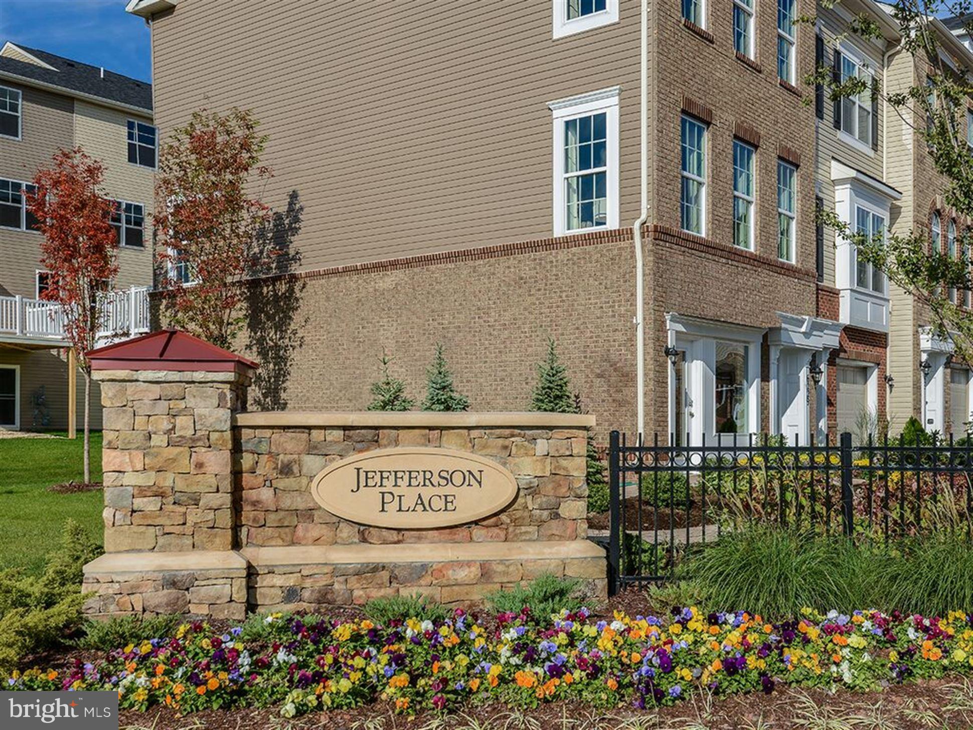 Best Price for this mint condition four-level unit loaded with upgrades. Full level master bedroom with luxury master bath, two junior bedrooms with additional bath, open kitchen overlooking family room. Beautiful rich chocolate hardwood floors throughout, except for steps where carpeting was installed for safety. Beautiful full deck for grilling & garage to enter your first level rec room.