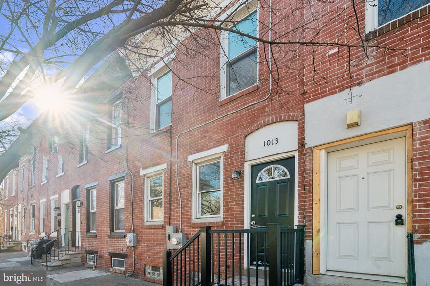 $6,240 (3%) CLOSING COSTS assistance with full price offer.  This beautifully renovated brick home at 1013 N Pine Street in Wilmington, DE, offers 3 bedrooms and 2 bathrooms. Completely updated, the property blends modern style with classic charm. Inside, you'll find an open-concept living space with laminate flooring, recessed lighting, and fresh paint throughout. The kitchen features sleek gray cabinetry and granite countertops. Additional highlights include central air conditioning and a convenient location near local amenities, parks, and schools. This move-in-ready home is ideal for first-time buyers or those looking to upgrade to a modern, renovated space. Be sure to ask about grant assistance for first-time buyers from the City of Wilmington, State Housing Authority, and WSFS, giving up the possibility of layering multiple grants.