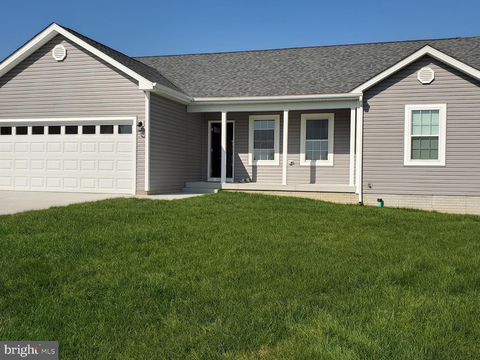 NEW HOME! FOR RENT! Be the first to live in this beautiful home. Located in the Prentiss Point Single Family Community within the city of Martinsburg, this BRAND NEW townhome offers 1-level living, and a large unfinished basement. 3 BR/ 2 Full, with 2 car garage with EV charging station within. Laminate LVP flooring throughout the main level. 36" doorways throughout the home. Upgraded kitchen with eat-in dining, island, upgraded cabinets, pantry, and stainless steel appliances. The master bedroom features a private bath with a large walking shower. Two additional bedrooms, a full hall bath, and laundry on the bedroom level just outside the bedroom doors! Excellent location with easy access to routes 340, 11, and 81. Close to shopping and restaurants. Brand new washer and dryer included. Applicant(s) must complete an application that will include credit, criminal, and eviction background checks. Pets are allowed with restrictions. No Smoking. Security deposit and first full-month rent due upon lease signing.
