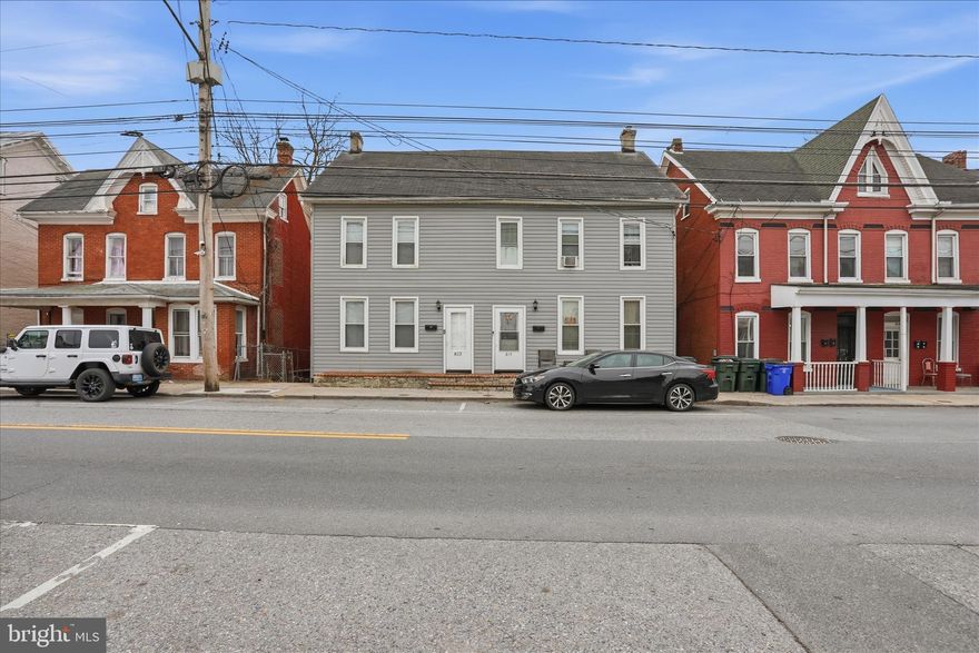 With a total finished area of 3,010 square feet, this twin/semi-detached home is designed to maximize rental potential while providing a warm and inviting atmosphere. Step inside to discover a well-maintained interior featuring a combination of laminate plank, carpet, and vinyl flooring that enhances both comfort and durability. The spacious dining area is perfect for gatherings, while the attic provides additional storage or potential for creative use. The bathrooms are equipped with tub-shower combinations, ensuring convenience for tenants. The property is fitted with vinyl, double-pane windows that not only enhance energy efficiency but also allow natural light to flood the living spaces. The exterior boasts low-maintenance vinyl siding, complemented by inviting patios, balconies, and porches that create ideal spaces for relaxation. Sidewalks enhance the neighborhood's walkability, making it appealing for potential renters. The level rear yard offers a semi-private outdoor retreat, perfect for gardening or outdoor activities, adding to the property's overall charm. The property comes equipped with essential appliances, including a refrigerator, stove built-in microwave, and dishwasher, ensuring that tenants have everything they need for comfortable living. This feature can significantly reduce initial setup costs for new renters, making the property more attractive in the rental market. Situated on a generous 0.2-acre lot, this property provides ample off-street parking for up to four vehicles, a valuable asset in urban settings. The paved parking area adds convenience for tenants and guests alike. The level lot is easy to maintain, reducing long-term upkeep costs for investors. With its desirable features and prime location, this property presents an excellent opportunity for investors looking to capitalize on the rental market. The potential for steady rental income, coupled with the property's good condition, makes it an attractive option for both seasoned and new investors. This property not only offers a comfortable living environment but also the promise of strong returns, making it a wise addition to any real estate portfolio. Don't miss the chance to invest in a property that embodies both charm and opportunity!
