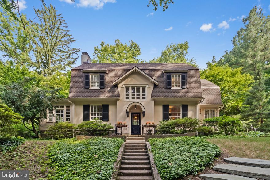 Picturesque, stucco 1890 Colonial poised on a bucolic half-acre lot with original, detached unfinished two-story Carriage House in prime Roland Park. Serenity and livability abound inside and outside of this beautiful, inspirational home perched in a parklike setting with extensive landscaping, hardscaping, walking paths and private footbridge over a babbling brook. Foyer entry leads to Library nook with custom built-ins, a formal Dining Room, Gourmet galley kitchen with separate window-wrapped Breakfast Room, a first-floor Powder Room, and spacious Living Room with wood-burning Fireplace and double French doors to the inviting four-season Sunroom/Family Room. The second floor boasts a Primary Bedroom with ensuite Primary Bathroom,  as well as two additional Bedrooms with a shared Full Bathroom and Laundry Room that was formerly an Office/4th Bedroom. Meticulous, thoughtful sellers have completed the following renovations and improvements within the last two years: all new stainless steel kitchen appliances, freshly painted interior and refinished hardwood floors throughout, new washer and dryer, new lighting fixtures and ceiling fans, professional landscaping and hardscaping, including expansive stone patio with retaining and seating wall, new concrete walkway from house to carriage house, landscape lighting, and built-in outdoor propane grill. Roland Park Schools and fantastic walkability to local parks, restaurants, The Village of Cross Keys, the Roland Park Library, Eddie's of Roland Park, Starbucks, and more.  A magical place to call home!

NOTE: The Carriage House/garage is sold As Is and has been most recently used for general storage and ping pong gatherings. It would make an ideal office space, yoga/workout room, or art/music studio. To be used to store vehicles it will require added structural support.