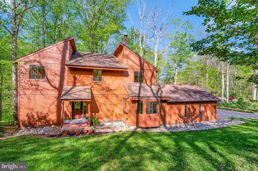 Nestled in the quiet neighborhood of Occoquan Forest, this charming 5-bedroom, 4-bathroom residence at 6171 Occoquan Forest Drive offers a perfect blend of comfort and natural beauty. This home is ideally positioned on a spacious lot, enabling full enjoyment of its serene outdoor space and lush surroundings.

Upon stepping inside, you'll find a thoughtful layout that balances cozy living spaces with generous room sizes, suited for both relaxation and entertaining. The house is designed to accommodate a variety of lifestyles, making it an inviting place for anyone looking for a peaceful retreat.

The true gem of this property is its enviable location. It boasts private access to the Occoquan River, presenting a unique opportunity for water activities and nature appreciation right in your backyard. Additionally, the property is conveniently located across the street from the main trailhead to the community trails . This proximity offers easy access to expansive green spaces and trails for hiking, biking, and outdoor exploration, fostering a strong connection with the environment.

Local amenities include Manassas Park train station, just a short drive away, facilitating commutes and travels. The home's placement in this established neighborhood further integrates community feel with quiet privacy.

This property not only promises a restful and picturesque setting but also a practical and versatile living space. It’s an ideal home for those who cherish both outdoor adventure and the comforts of suburbia. Come and envision your new beginning while the opportunity lasts!