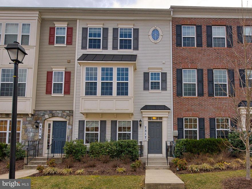 Spacious home in great commuter location! Light-filled w/ plenty of space to entertain. Entry-level bonus room! Main level features open concept living: gleaming hardwoods, large eating area, breakfast bar, half bath. Enjoy morning coffee on the huge deck. Upper level features large Master suite w/ walk-in closet, spa bath w/dual sinks! 2 more large bedrooms, hall bath. Plus 2-car attached garage!