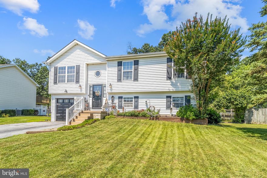 MOTIVATED SELLER OFFERING CLOSING COST ASSISTANCE!!  Welcome to 266 Nottingham Blvd! This one-owner home offers the perfect blend of comfort, privacy, and space. Tucked away with a fenced backyard that backs to mature trees, you’ll enjoy peace and quiet with plenty of room for entertaining. Step outside to find multiple rear decks, ideal for hosting gatherings or simply relaxing in nature. A convenient storage shed adds extra space for your tools and equipment. Inside, you’ll love the open-concept living area with a spacious kitchen island, perfect for casual meals and conversations. The main level features three generously sized bedrooms and two full bathrooms. Downstairs, a finished basement offers flexible living space that could serve as a fourth bedroom, rec room, or home office, complete with a half bath. The attached garage is a standout feature, equipped with its own heating and air conditioning, making it perfect for a workshop, hobby space, or additional year-round storage. Don’t miss this opportunity to own a versatile, well-cared-for home in a peaceful, tree-lined setting!